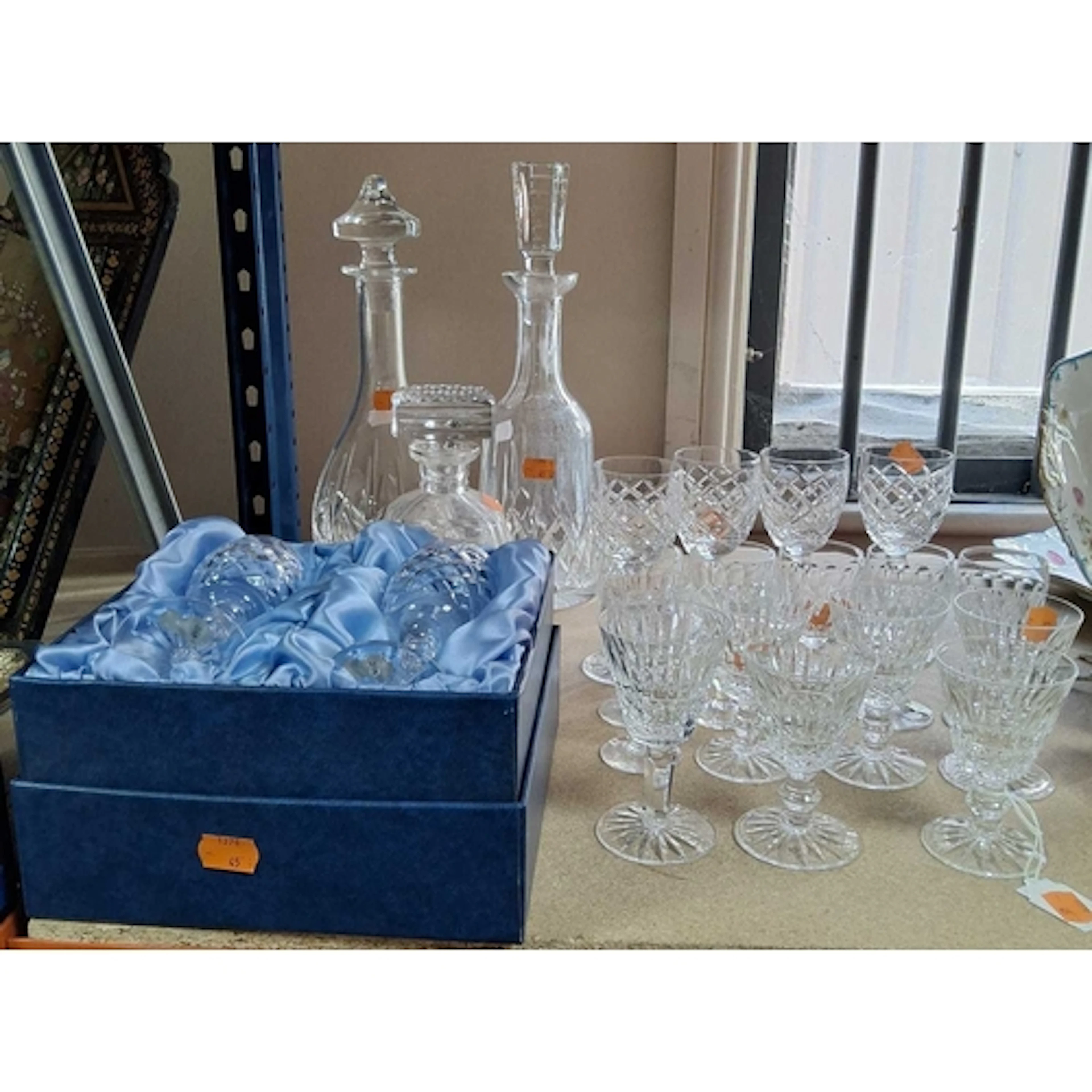 A GROUP OF WATERFORD CRYSTAL, comprising a boxed pair and fo...