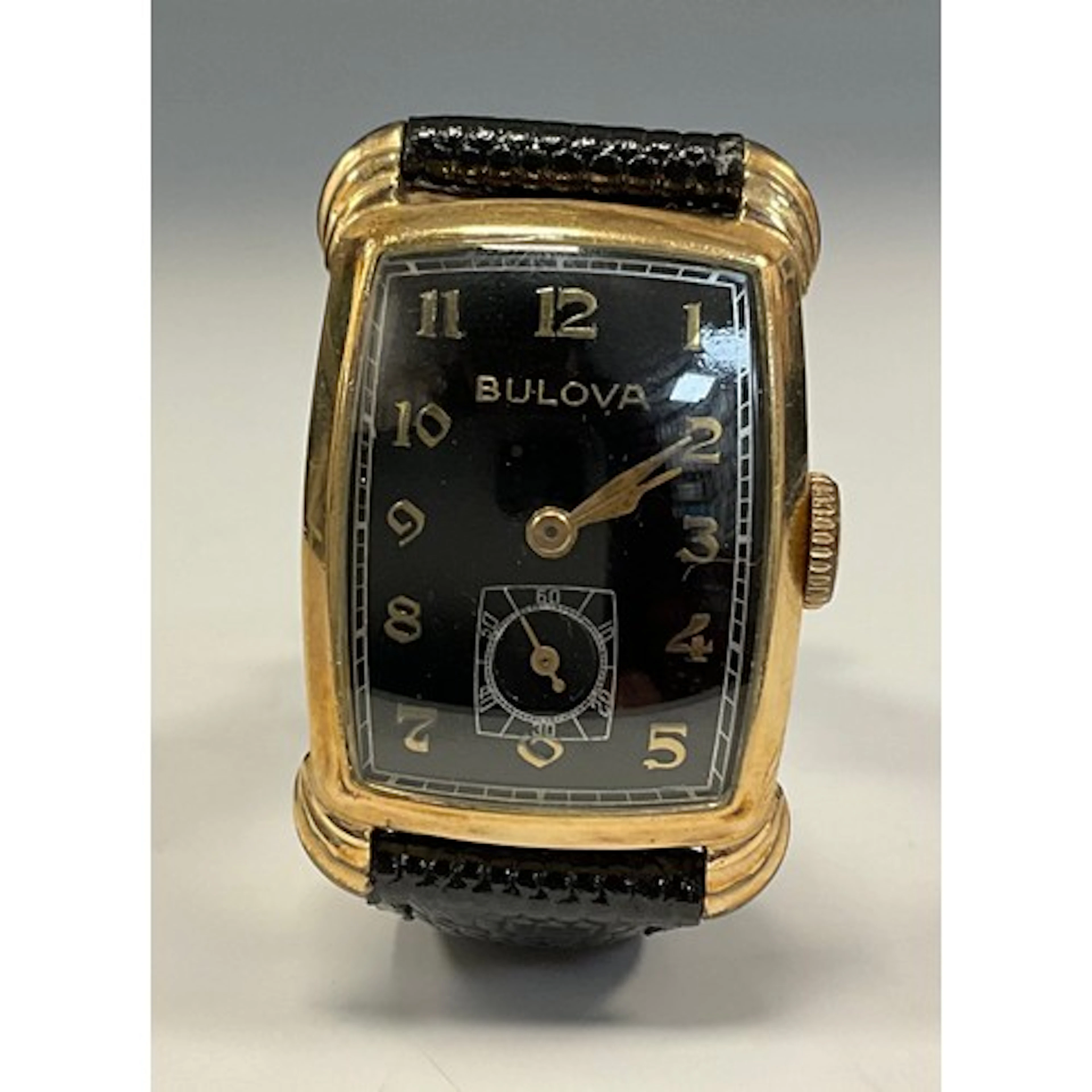 Bulova - a 1950s Senator 10k rolled gold and stainless steel...