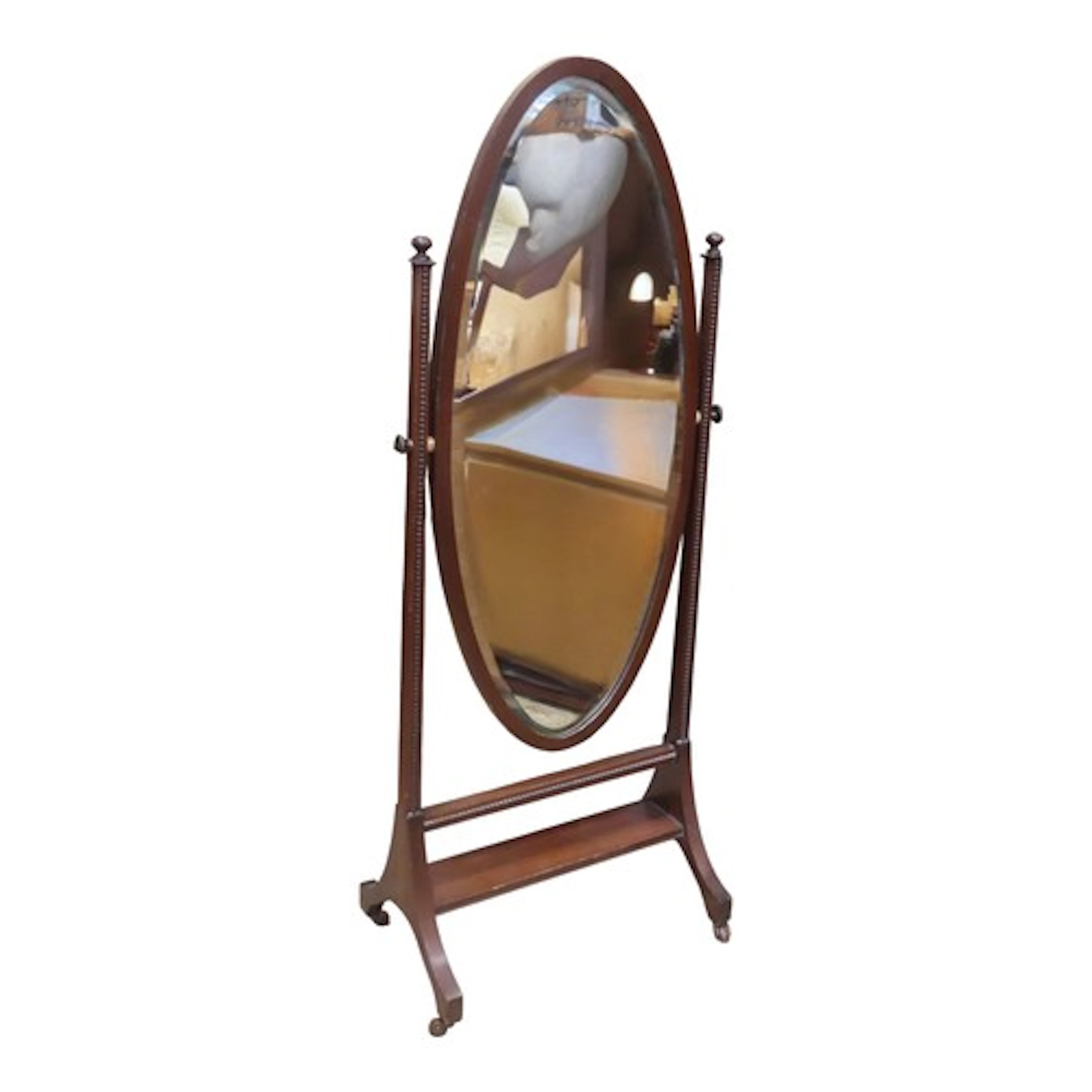 An Edwardian mahogany cheval mirror with oval bevel edge mir...