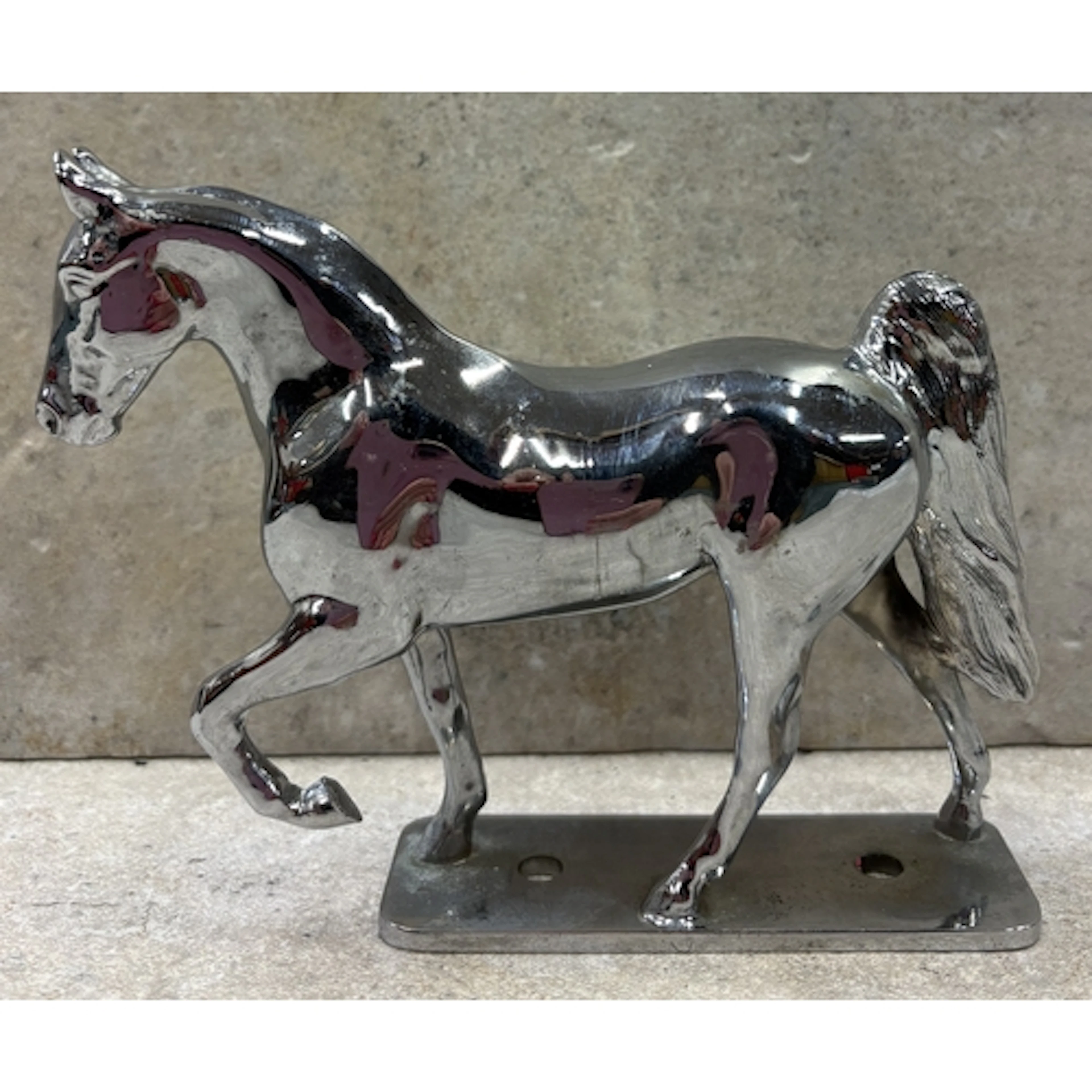 A bonnet mascot in the form of a horse. Est. £20 - £30.