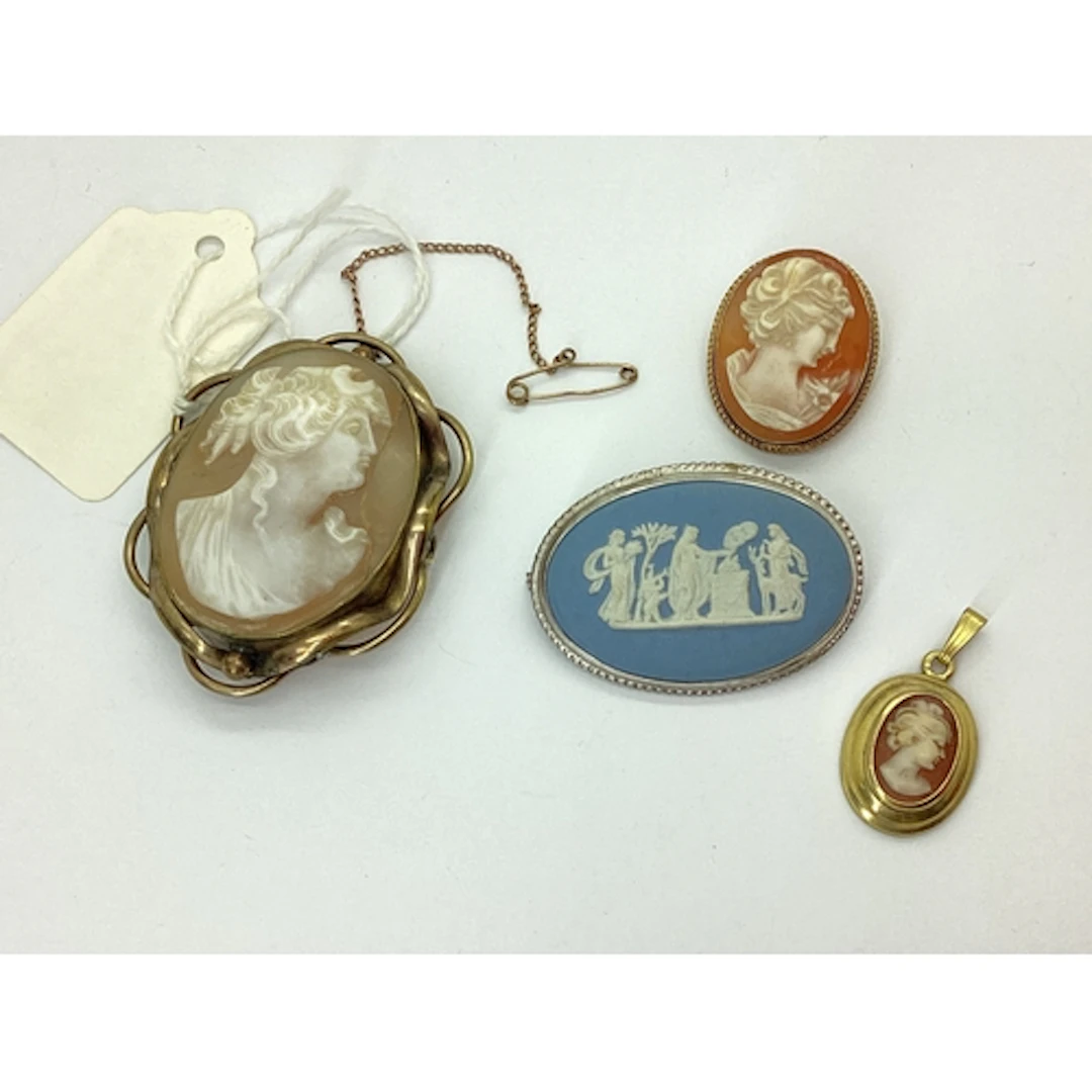 An Antique Oval Shell Carved Cameo Brooch, depicting female ...