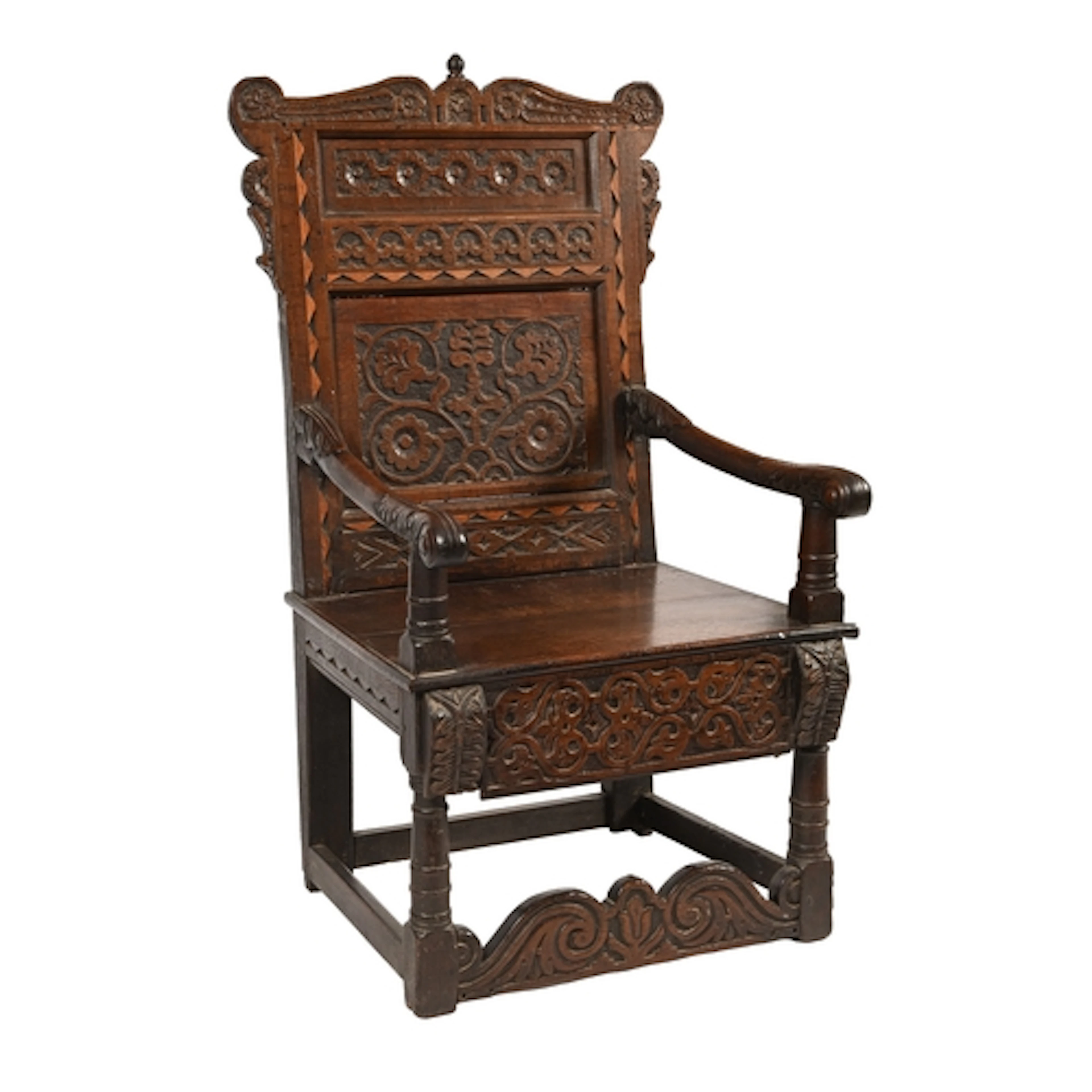 A Charles II oak armchair, 17th c and later, the two panels ...