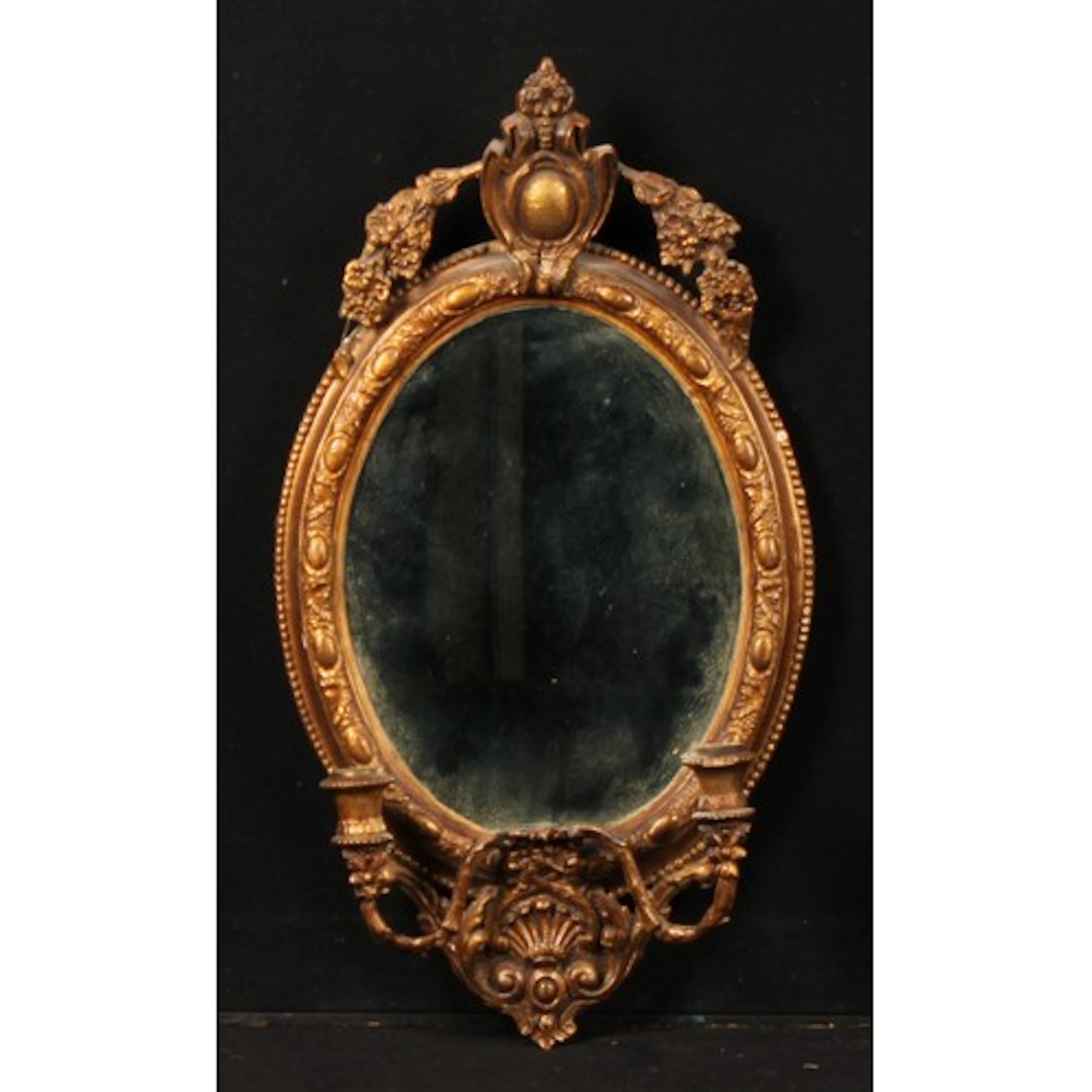 A Louis XV style gilt painted girandole looking glass, in th...