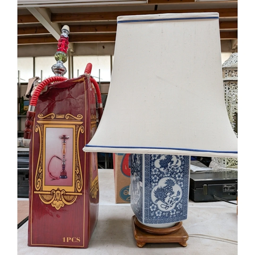 Modern blue and white Chinese table lamp on wooden base with...