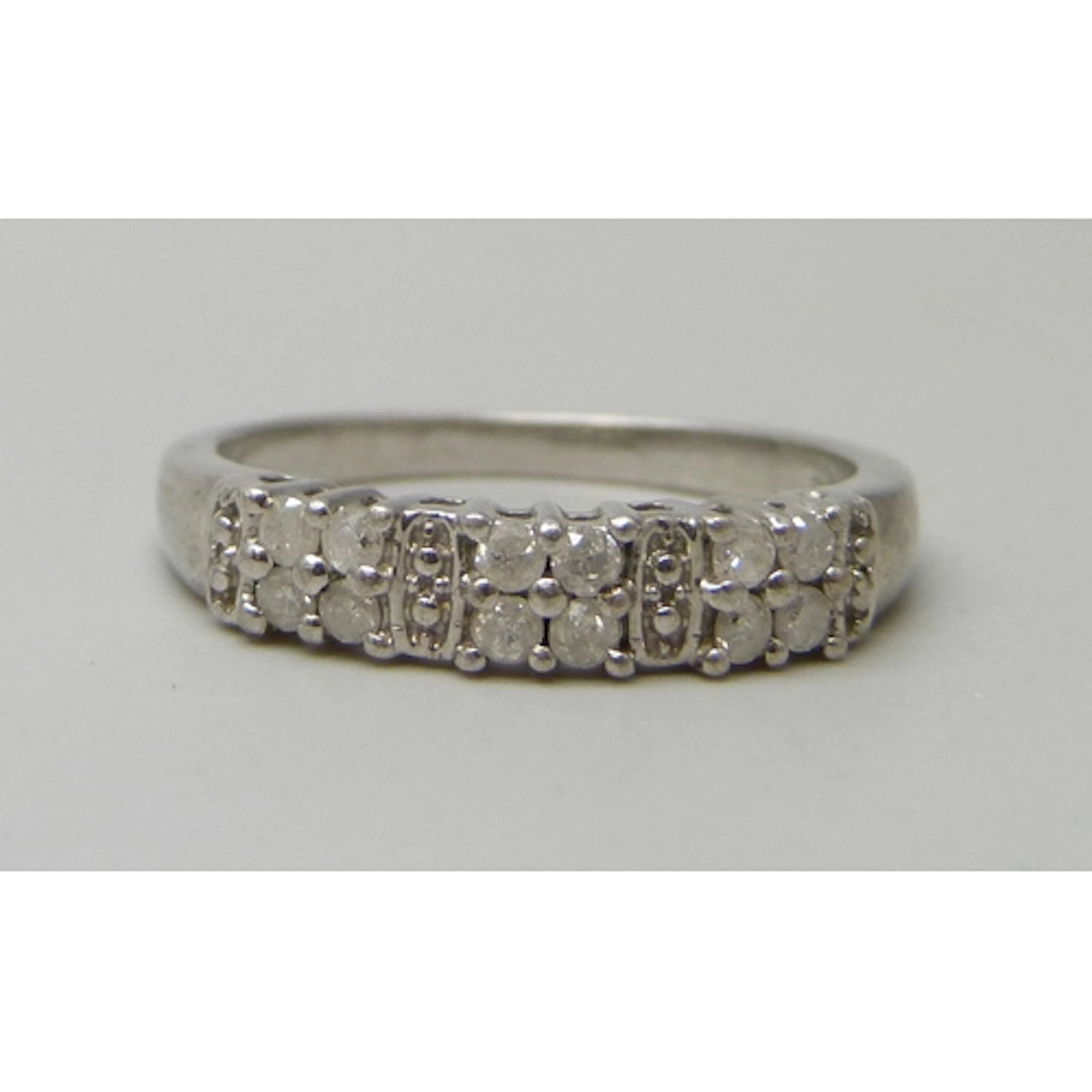 A TGGC silver and 12 stone diamond ring, R/S