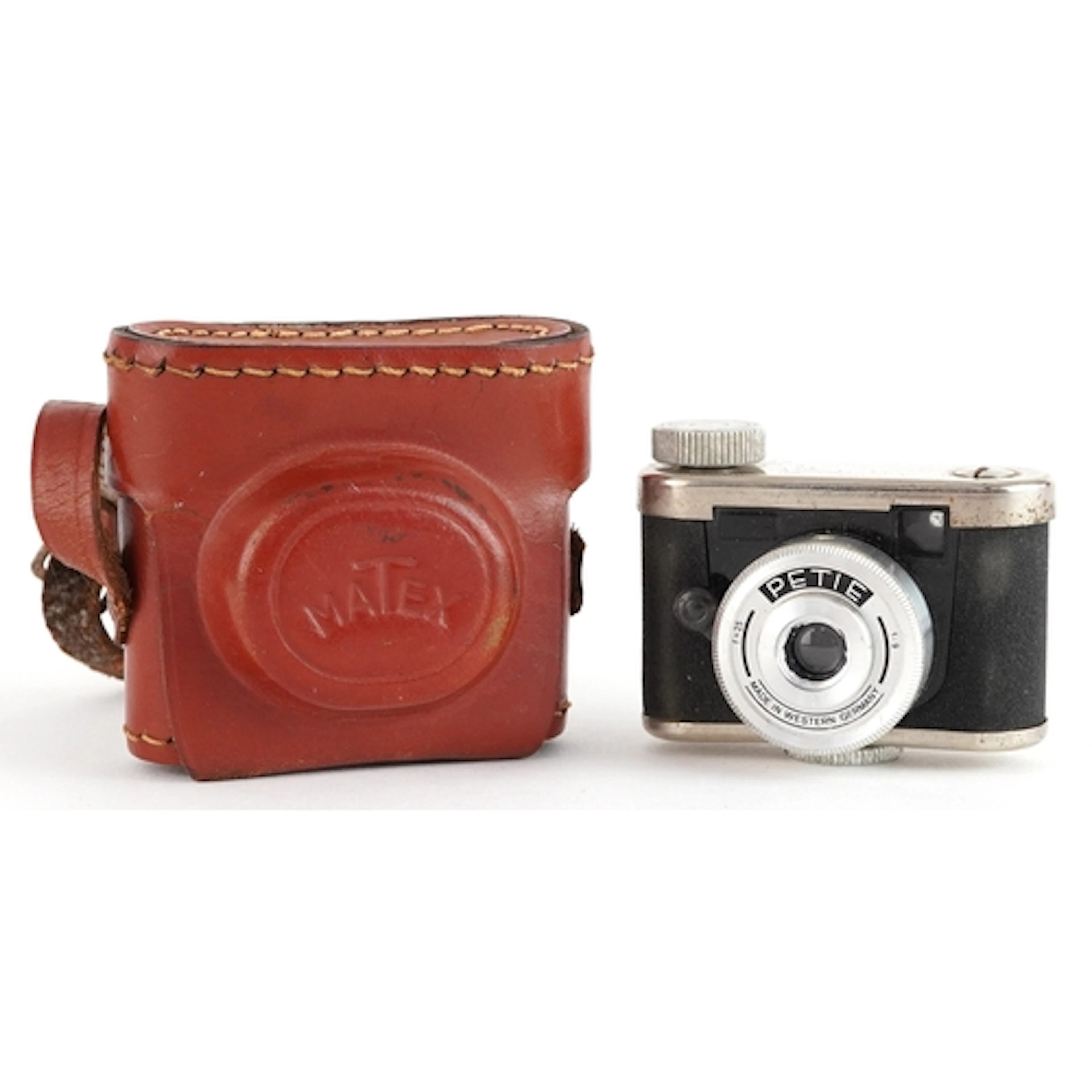Kunik Petie subminiature 25mm camera with F1.9 lens, housed ...