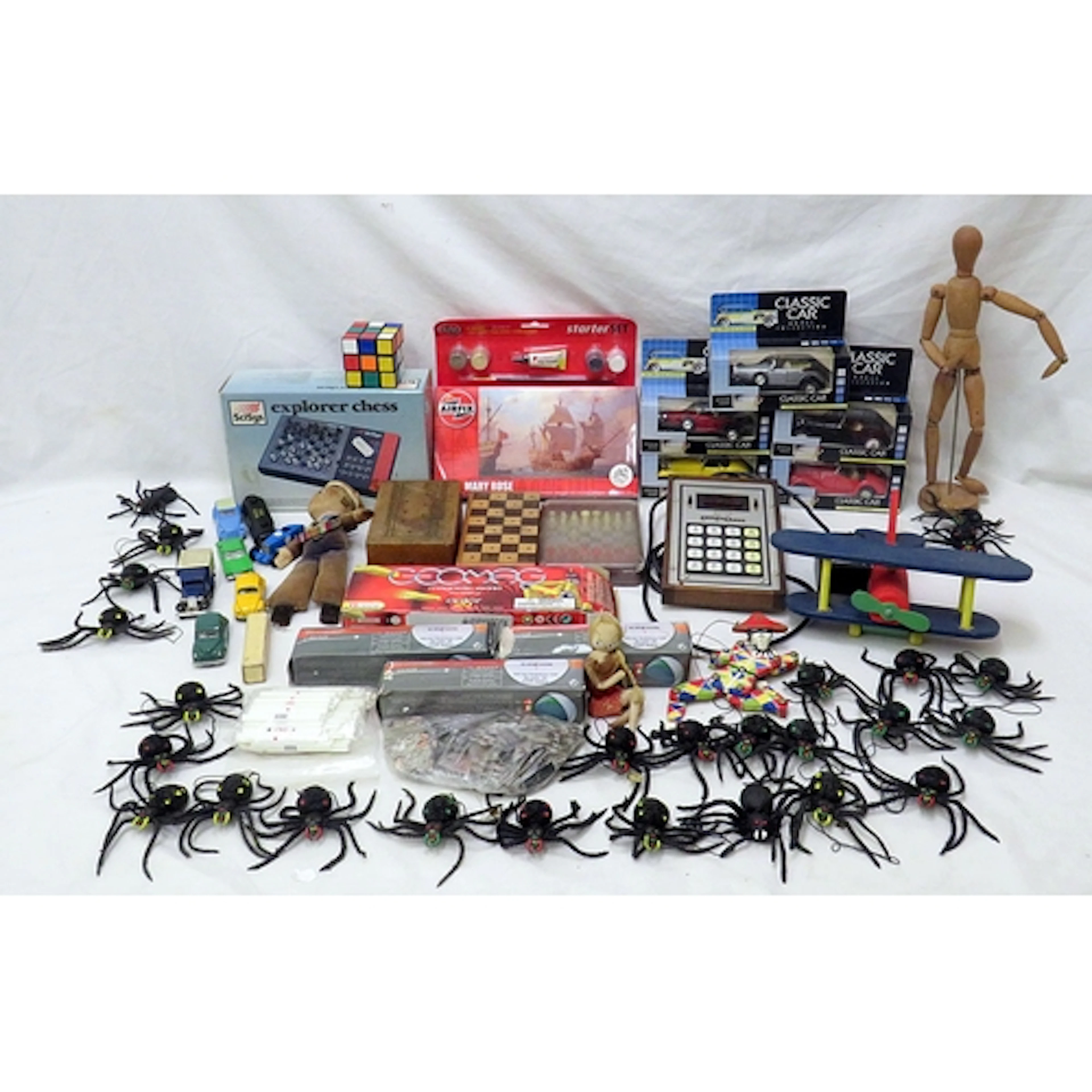 Boxed Model Vehicles, wooden aeroplane, artists model, Rubik...