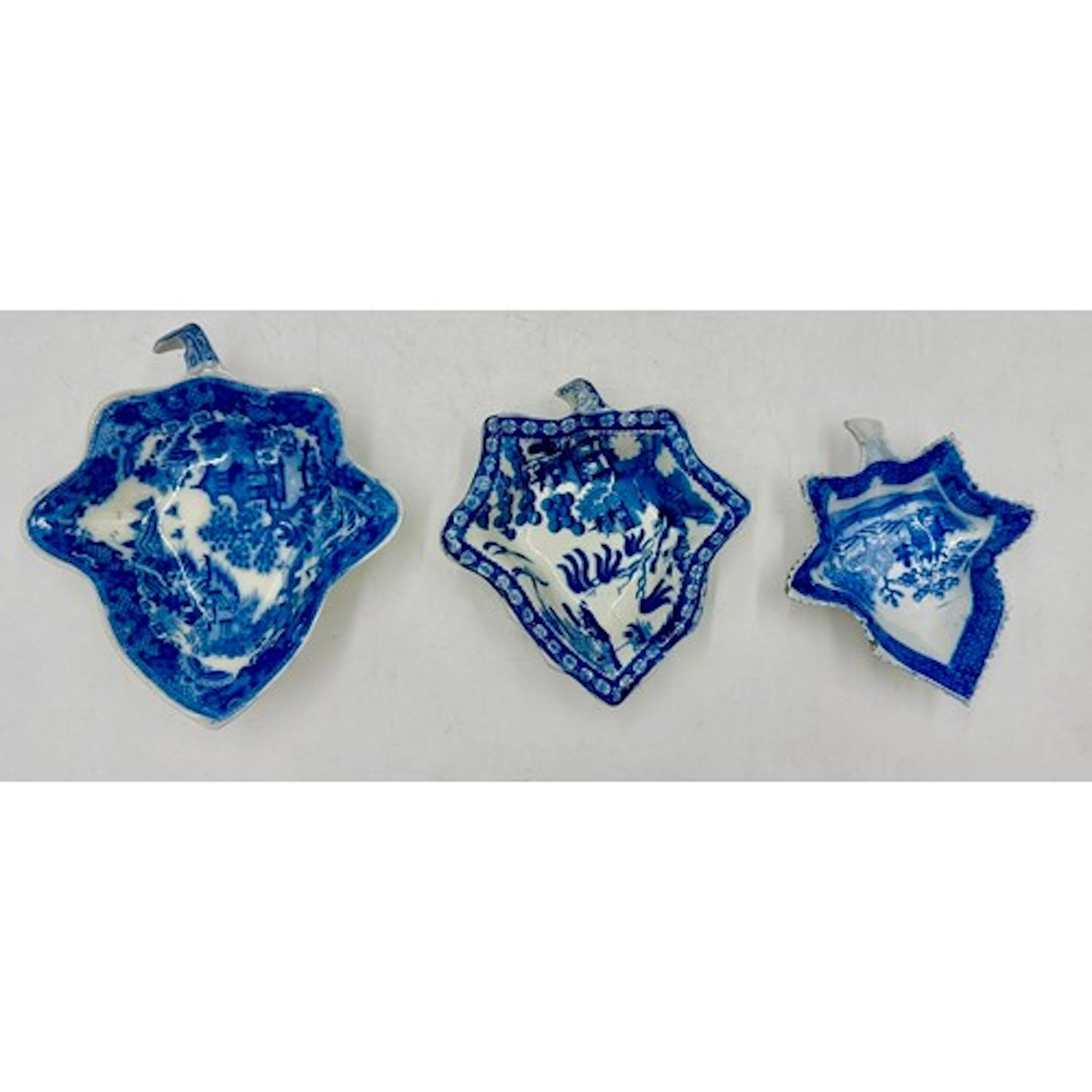 Three early 19th century blue and white transfer-printed Chi...