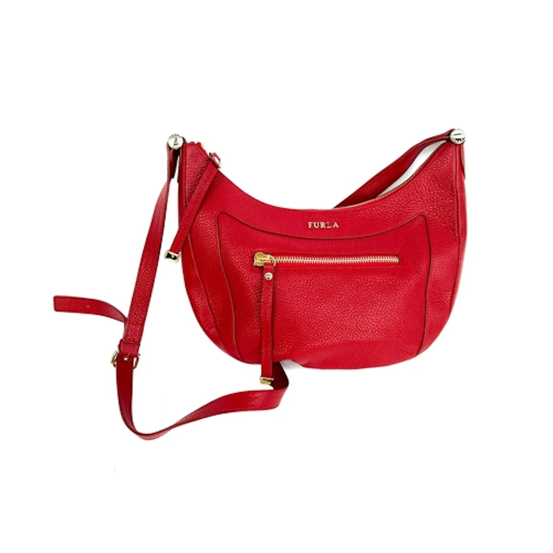 A Furla red leather shoulder bag, 31cmW