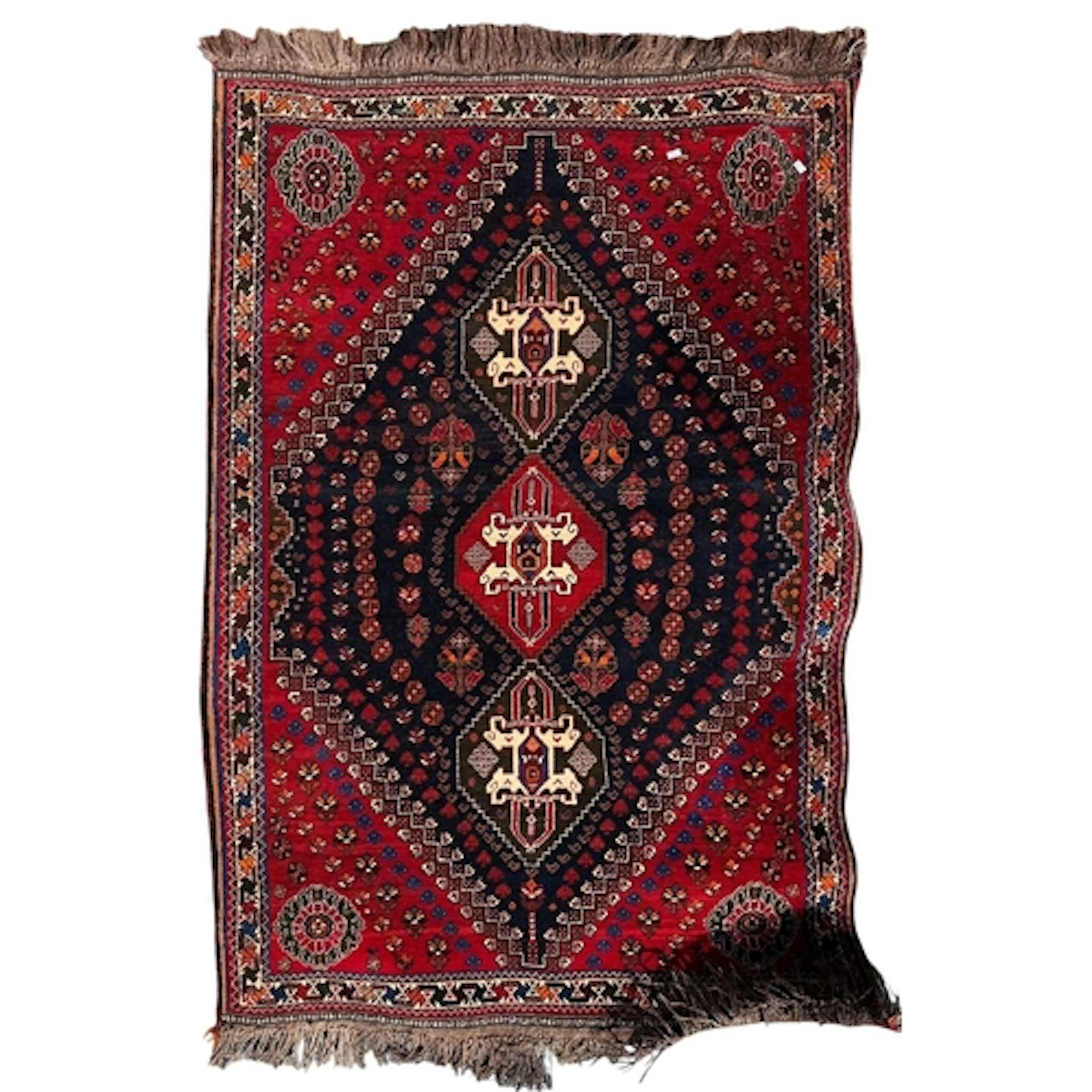 A 20th century Persian Islamic Shiraz wool floor carpet rug....
