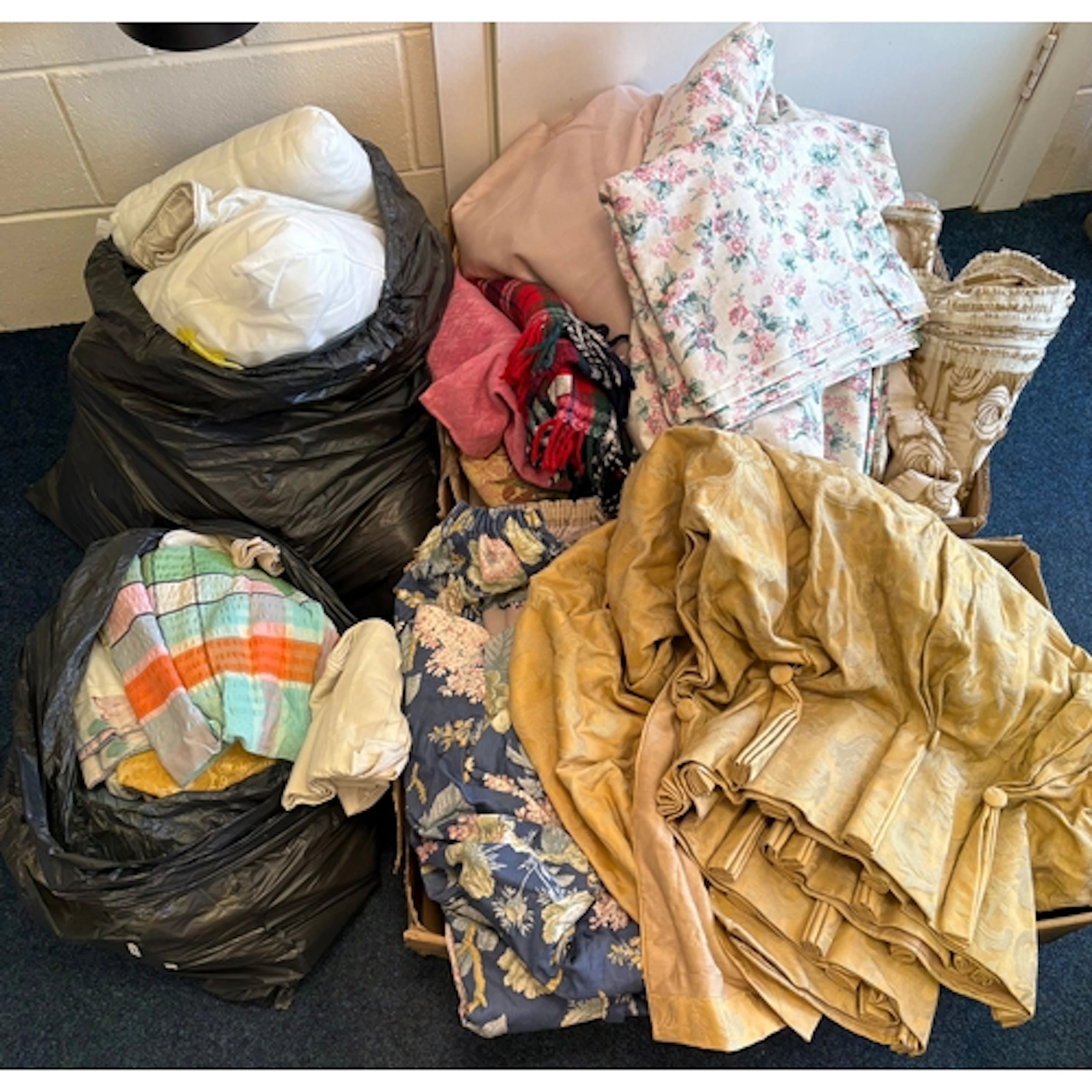 A large qty of misc textiles