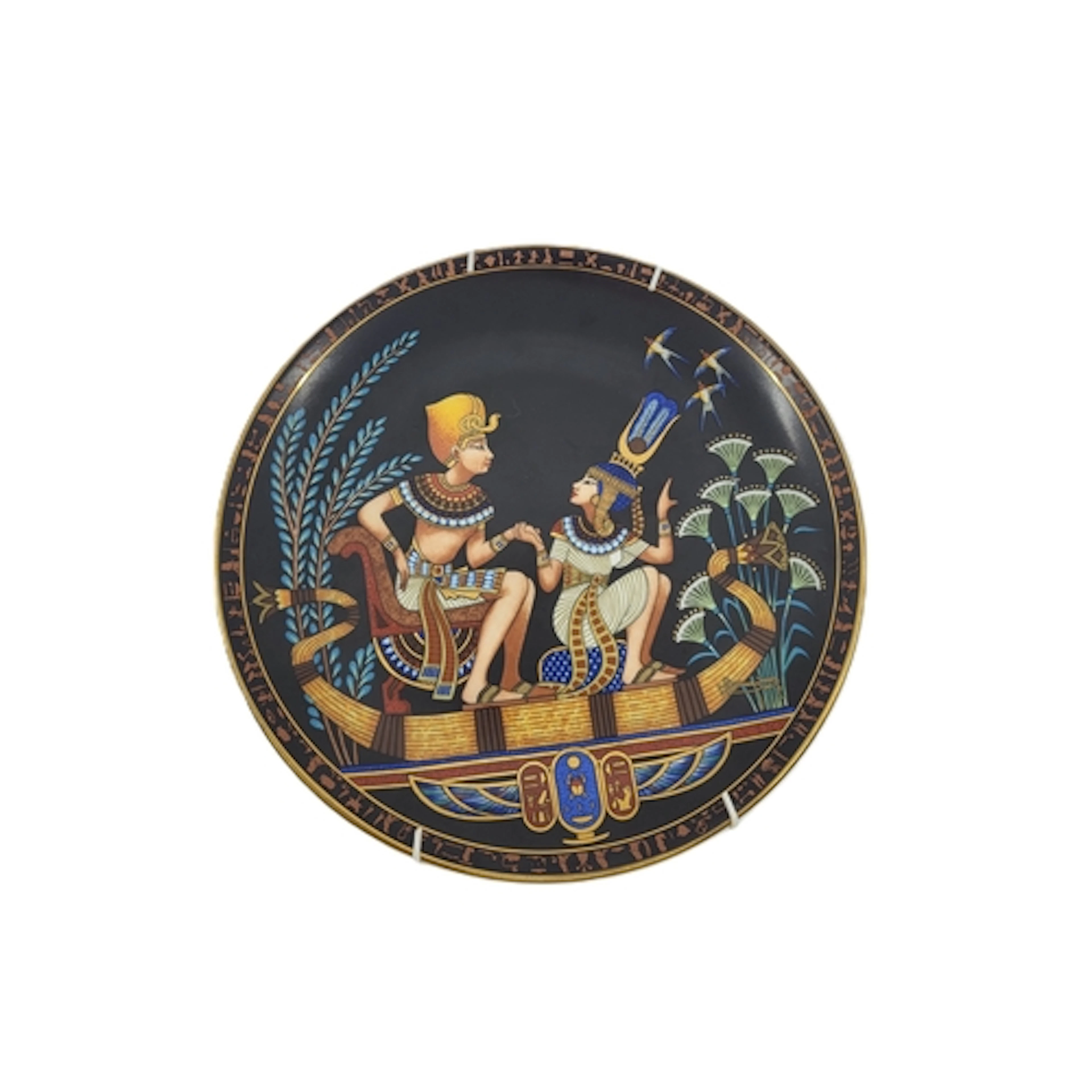 A MODERN EGYPTIAN LTD EDITION WALL PLATE, with gold painted ...