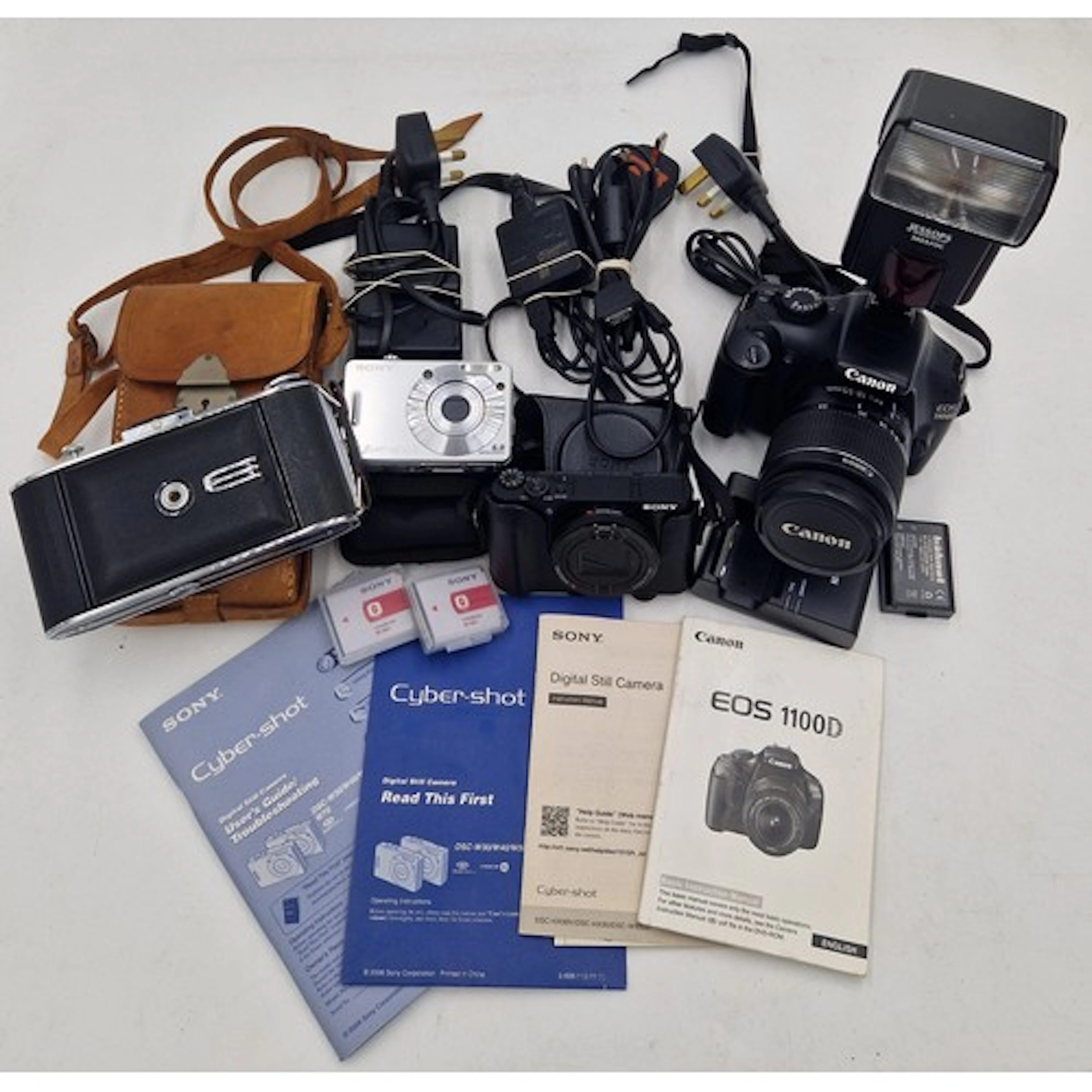 Collection of camera equipment to include Canon EOS 1100D DS...