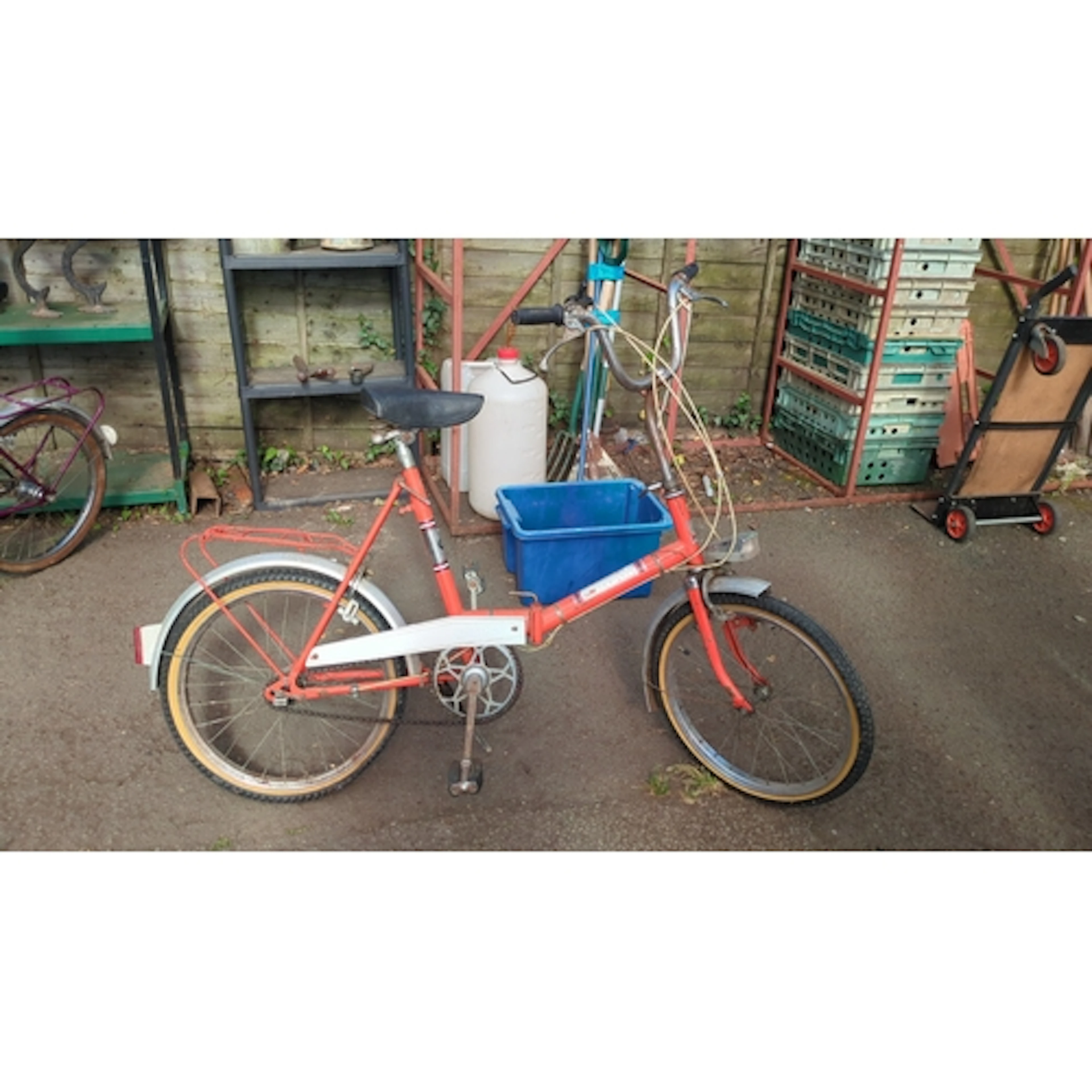 Vintage Universal step-through folding bicycle with red-pain...