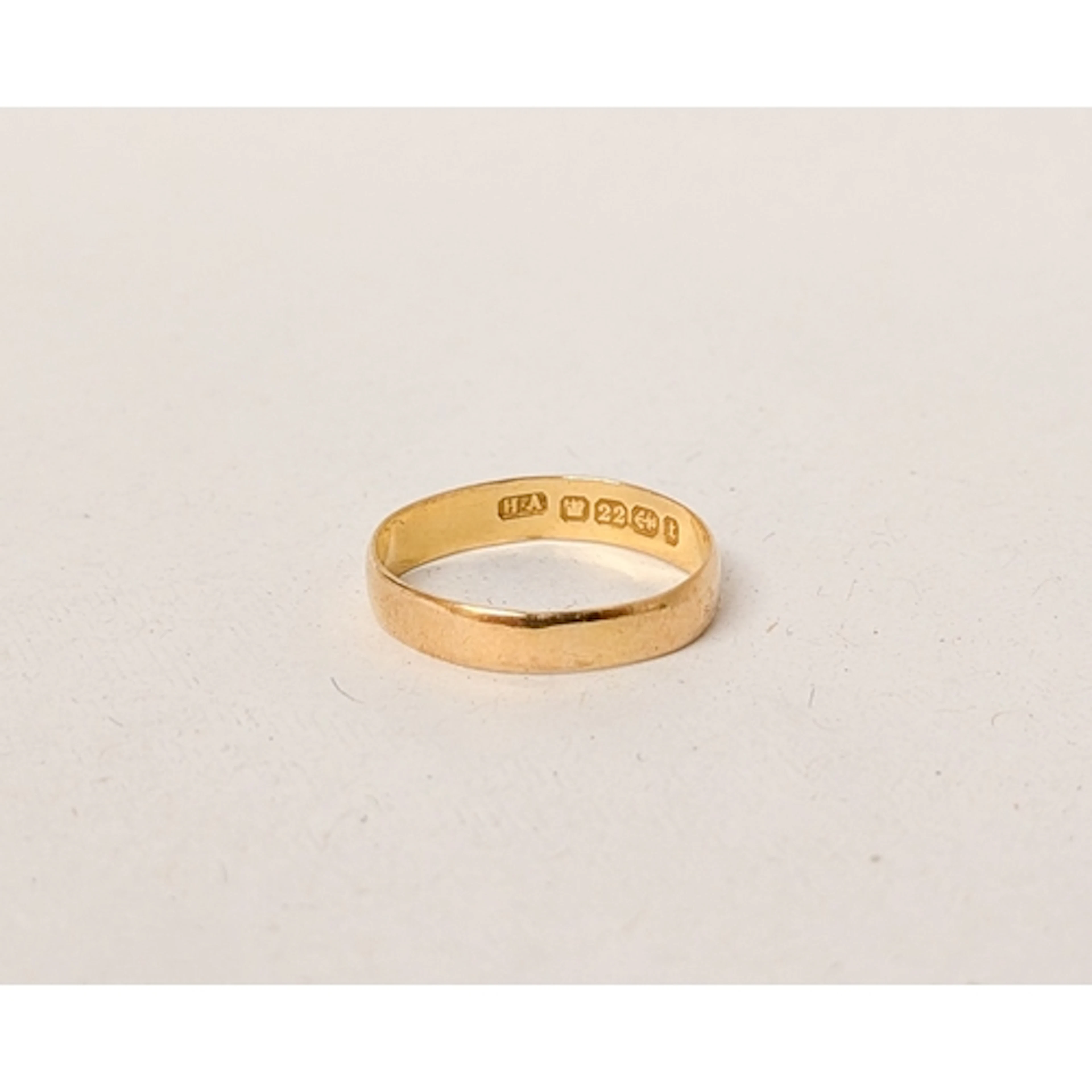 A 22ct gold wedding band, ring size P, 2.1 grams