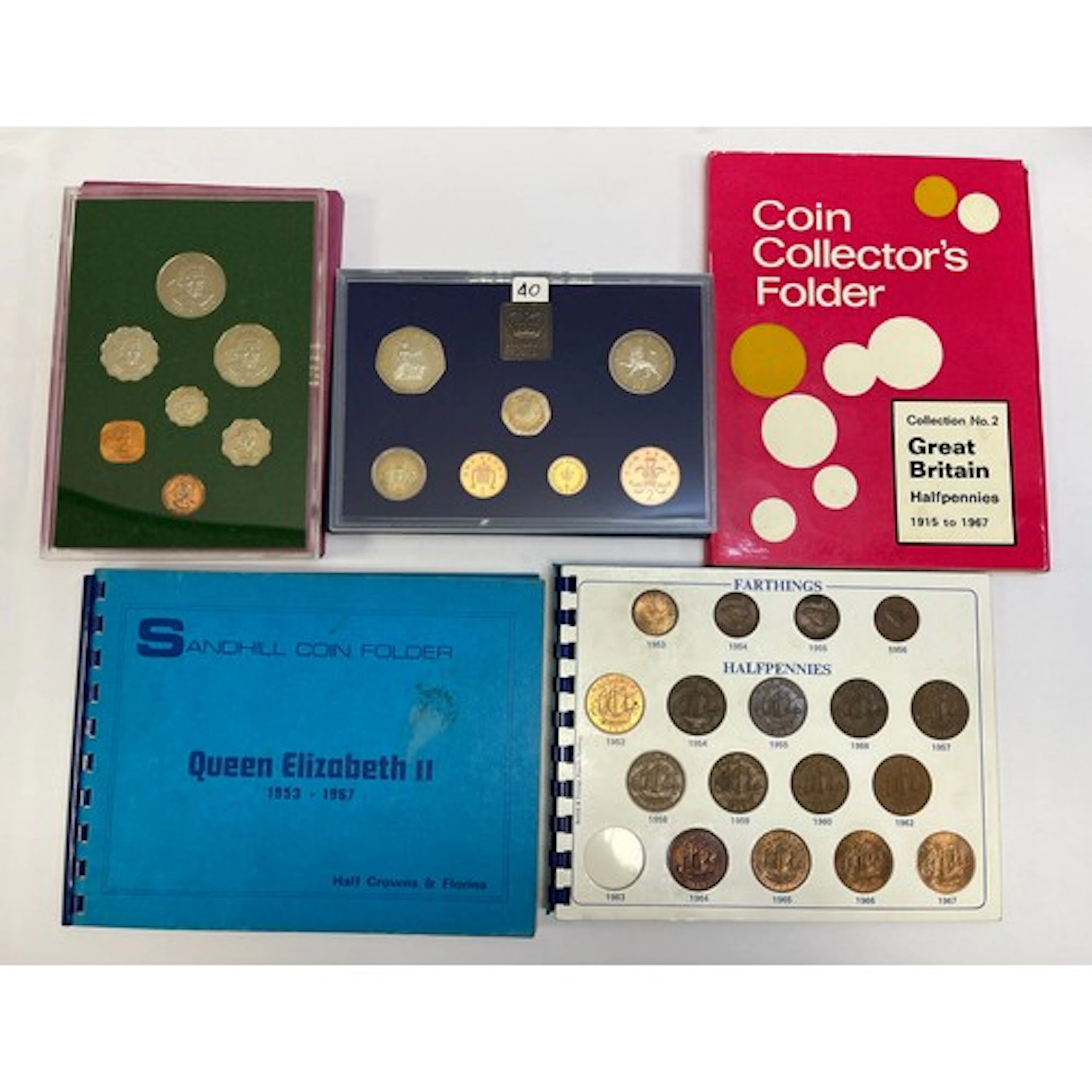 Five coin folders to include Queen Elizabeth II half-crowns,...