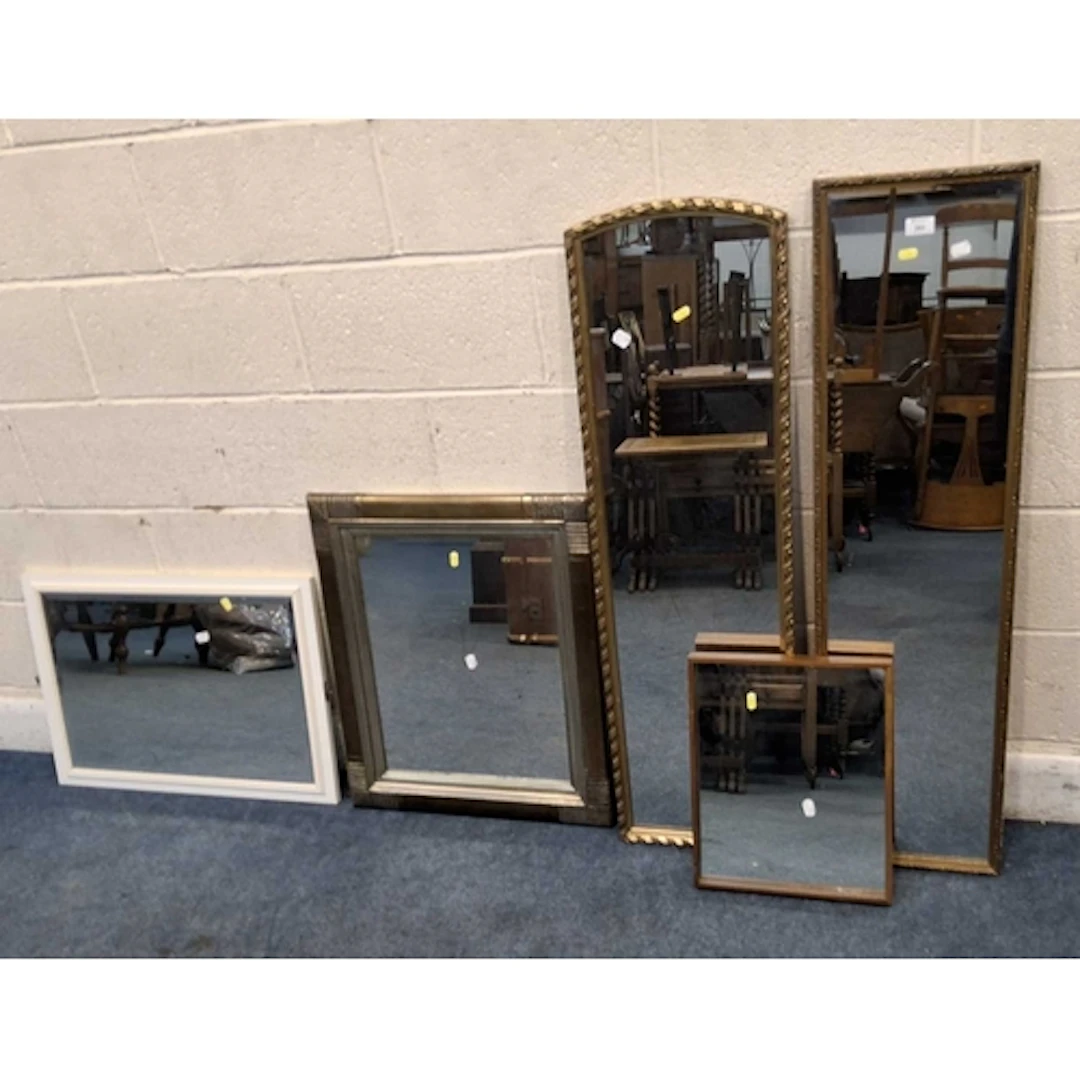 THREE WALL MIRRORS, and two dressing table mirrors, all vary...