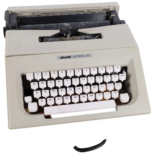 An Olivetti Lettera 25 portable typewriter, with wooden carr...