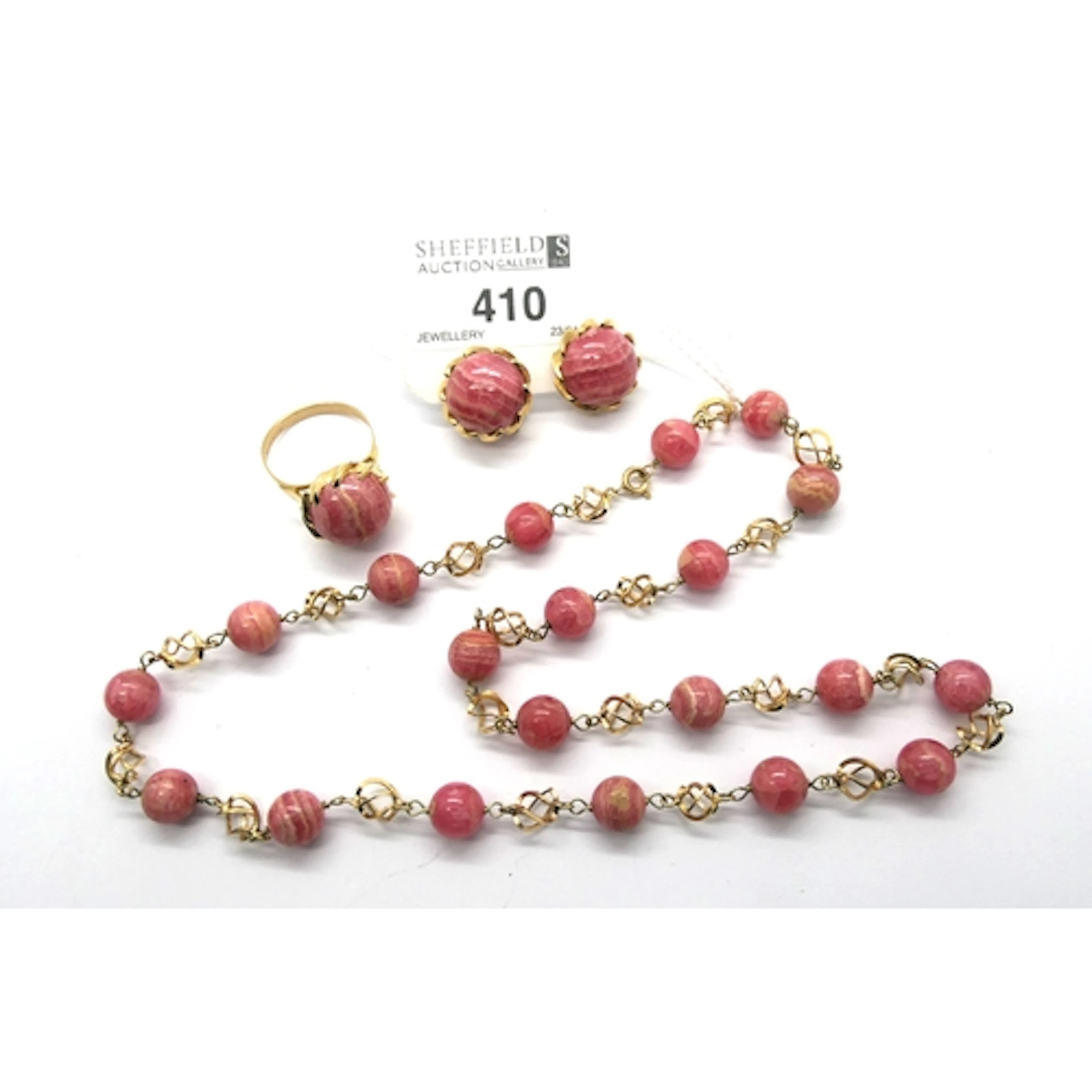 A Rhodochrosite Polished Bead Necklace, the uniform beads sp...