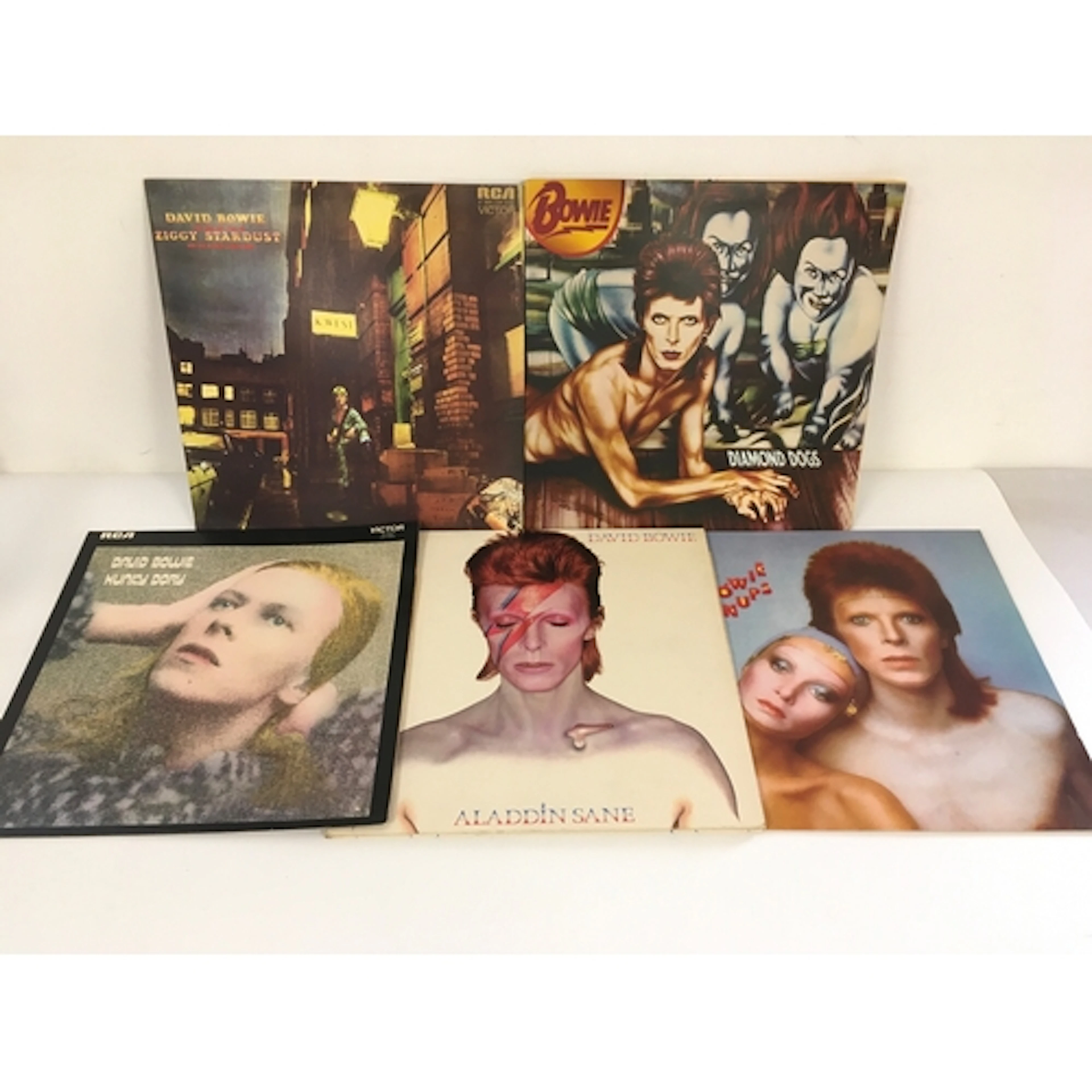 Five David Bowie LPs including Ziggy Stardust, Diamond Dogs ...