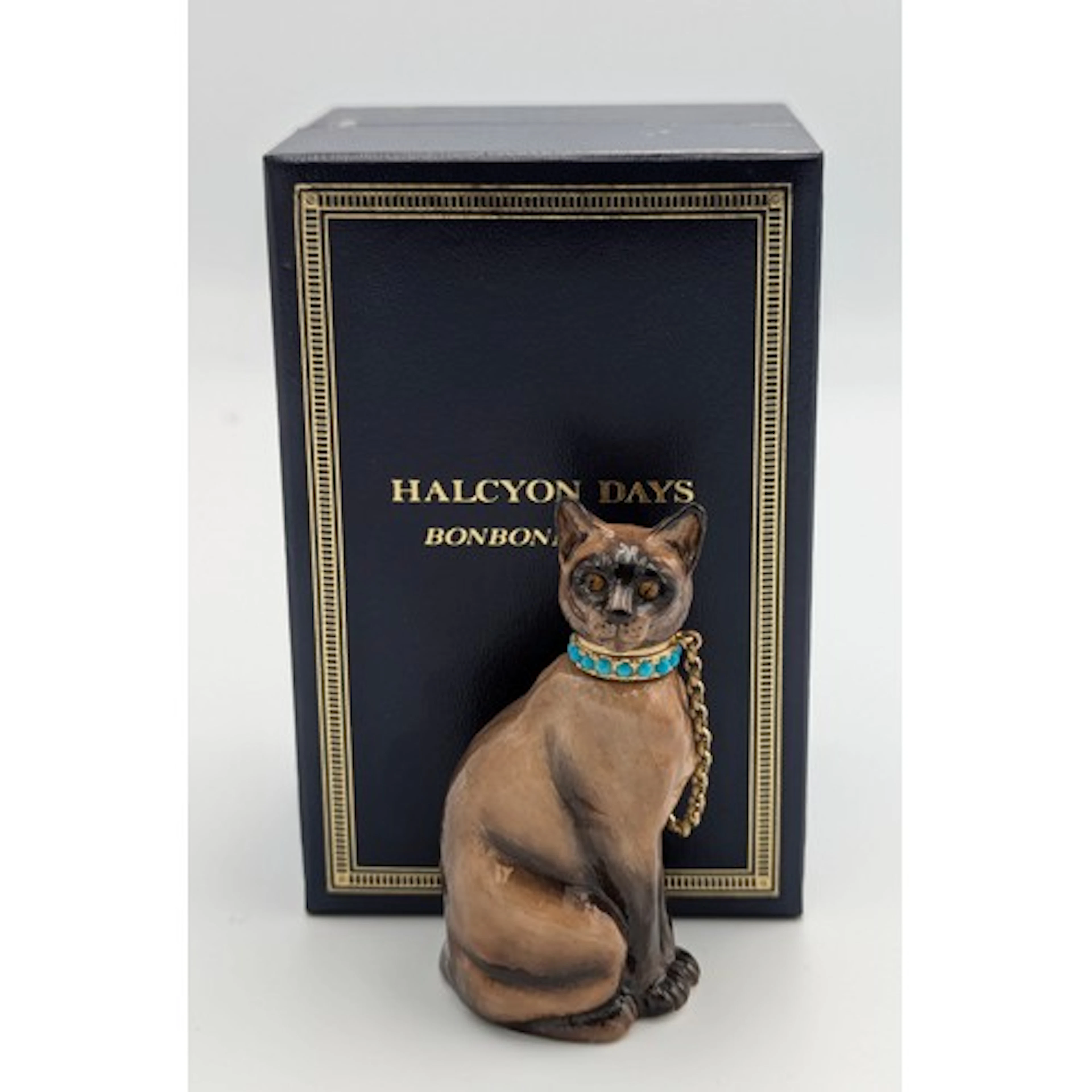 Halcyon Days - a 9ct gold mounted porcelain scent bottle, re...