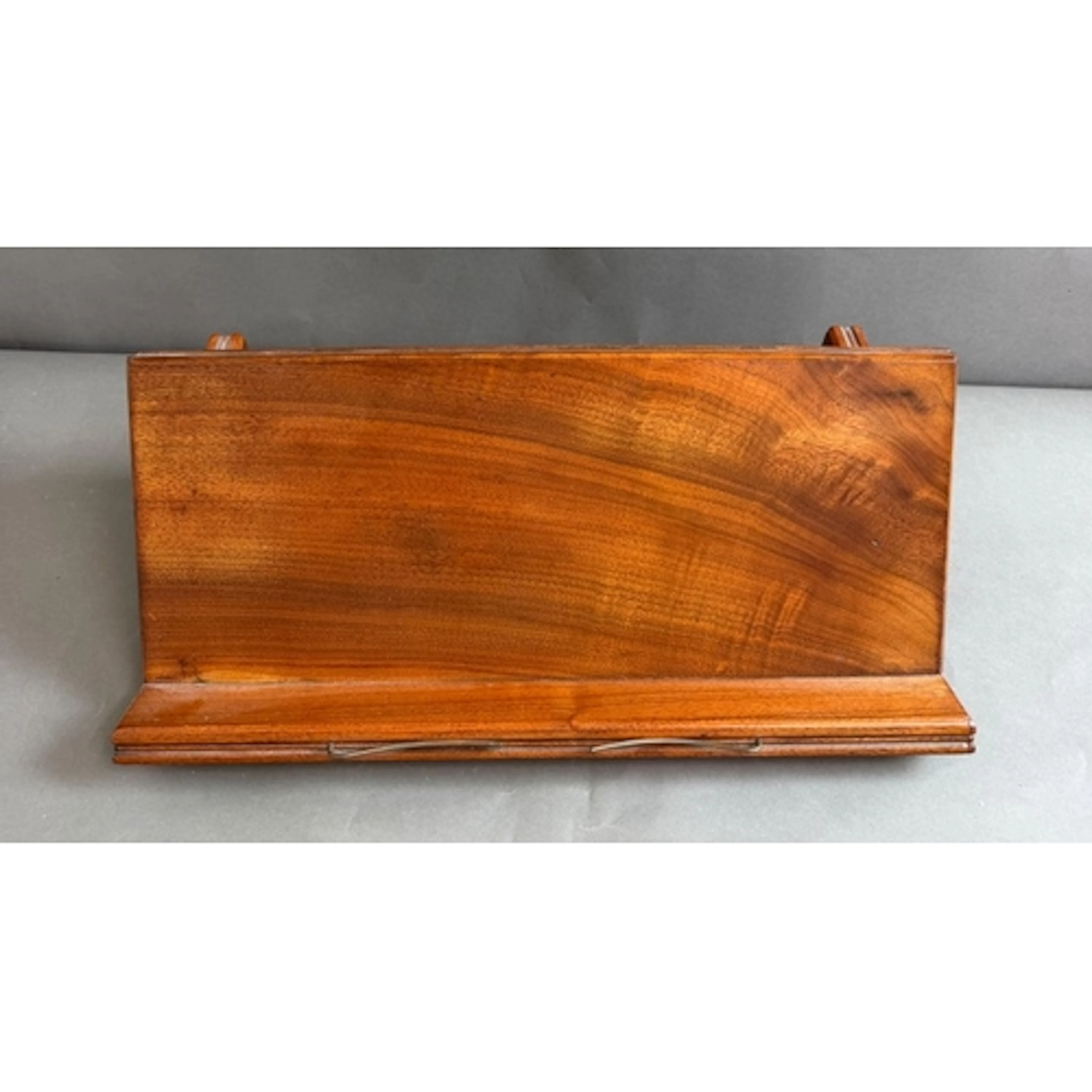 A wooden book rest