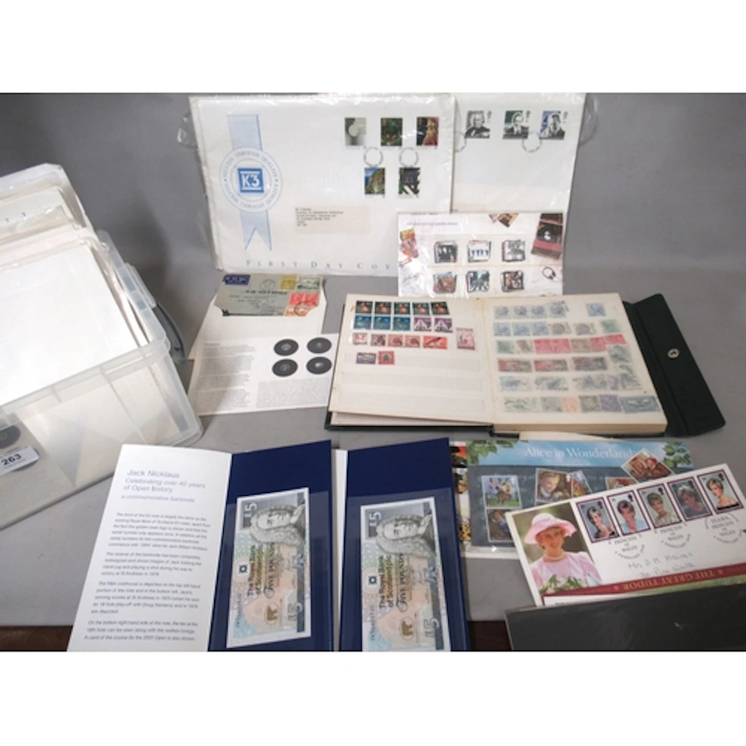 Box containing a small quantity of various First Day Covers,...