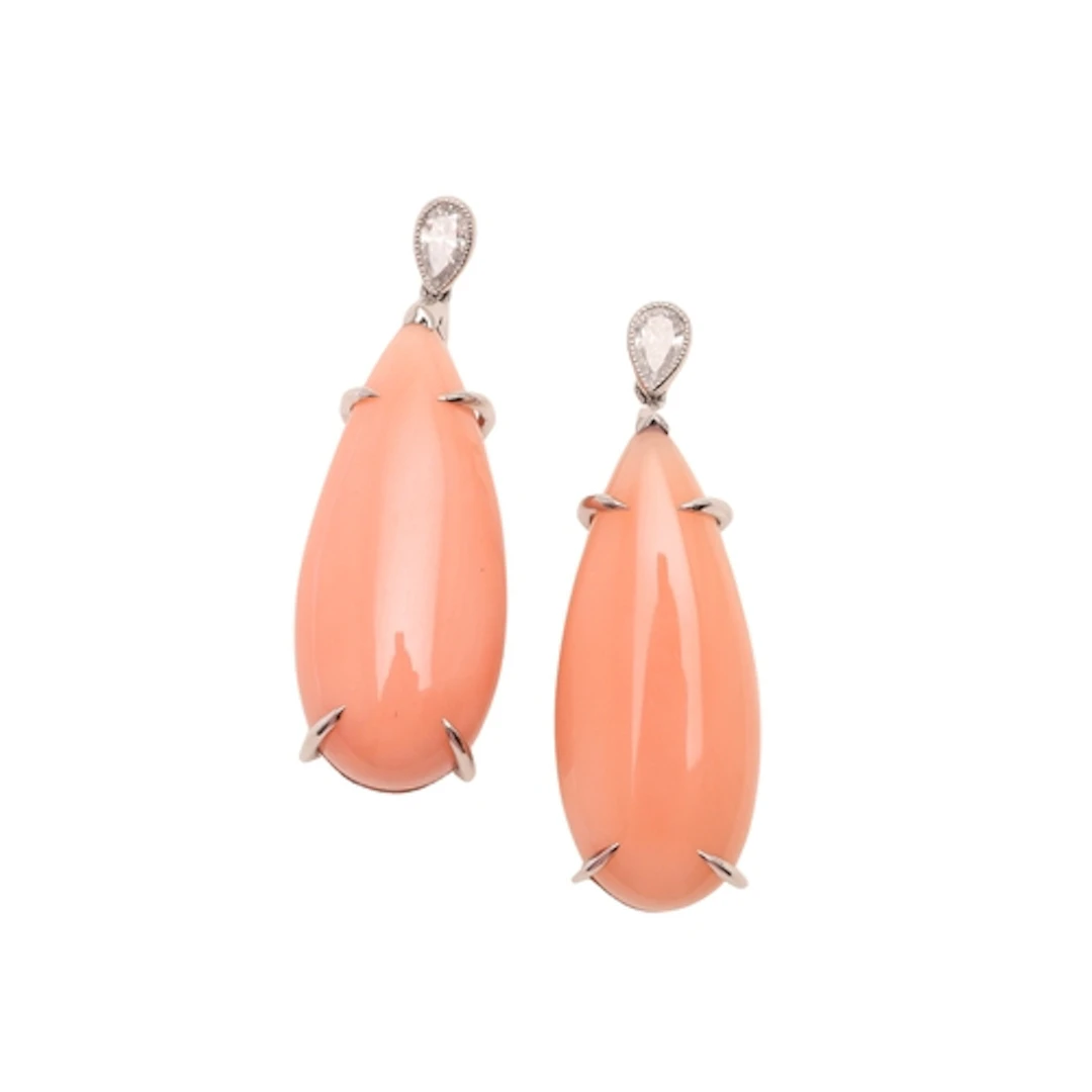 A PAIR OF CORAL AND DIAMOND DROP EARRINGS. each earring form...