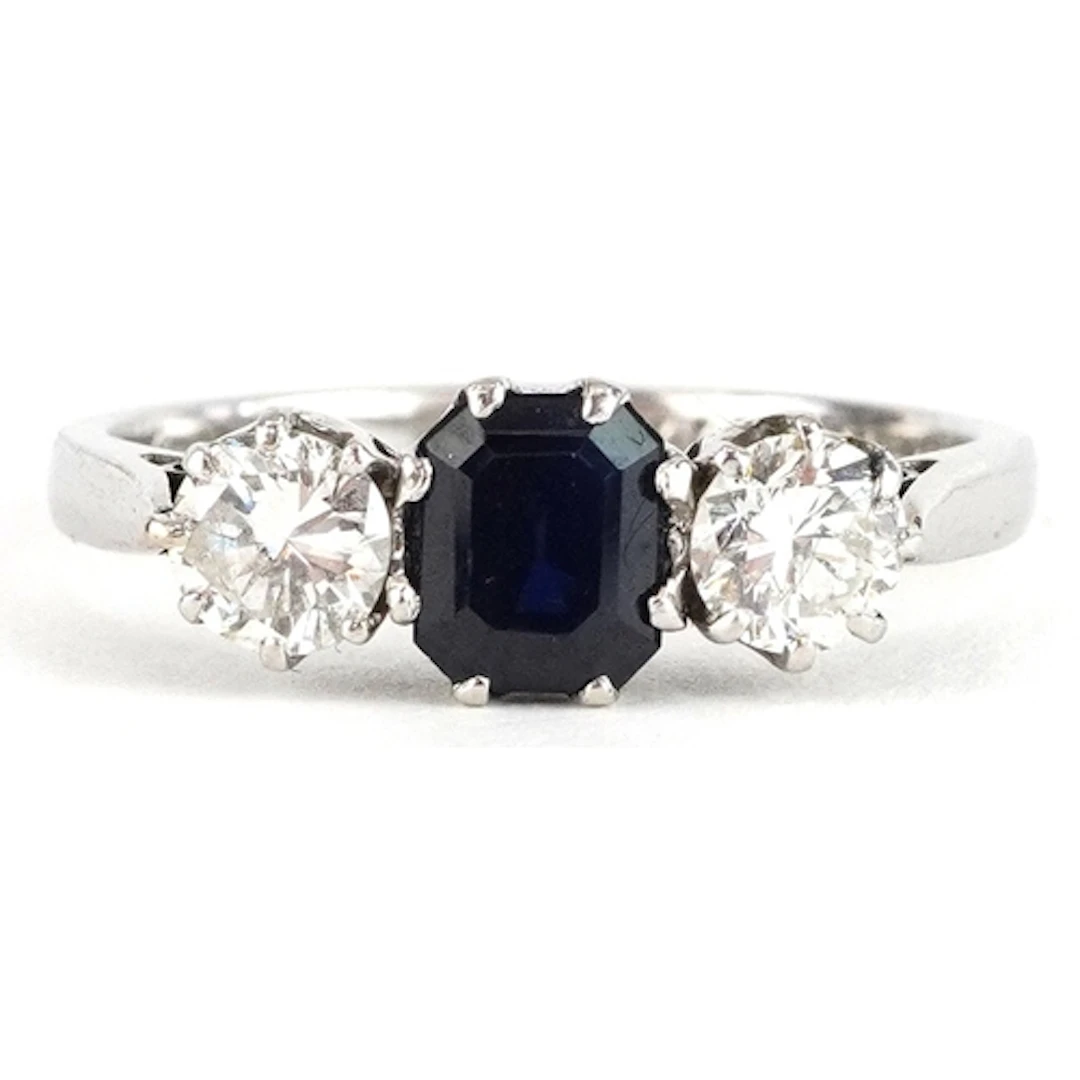 18ct white gold diamond and blue spinel trilogy ring, total ...
