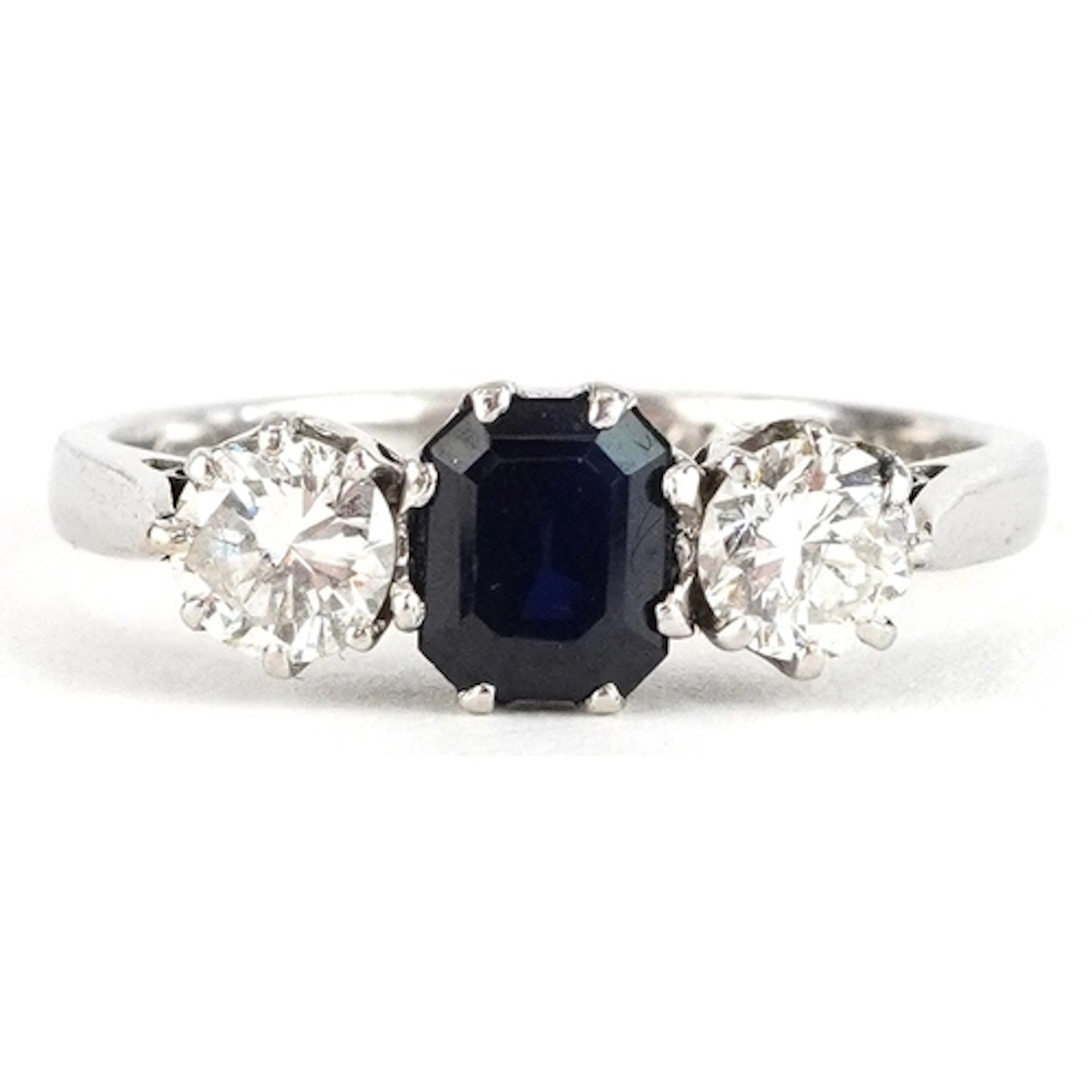 18ct white gold diamond and blue spinel trilogy ring, total ...