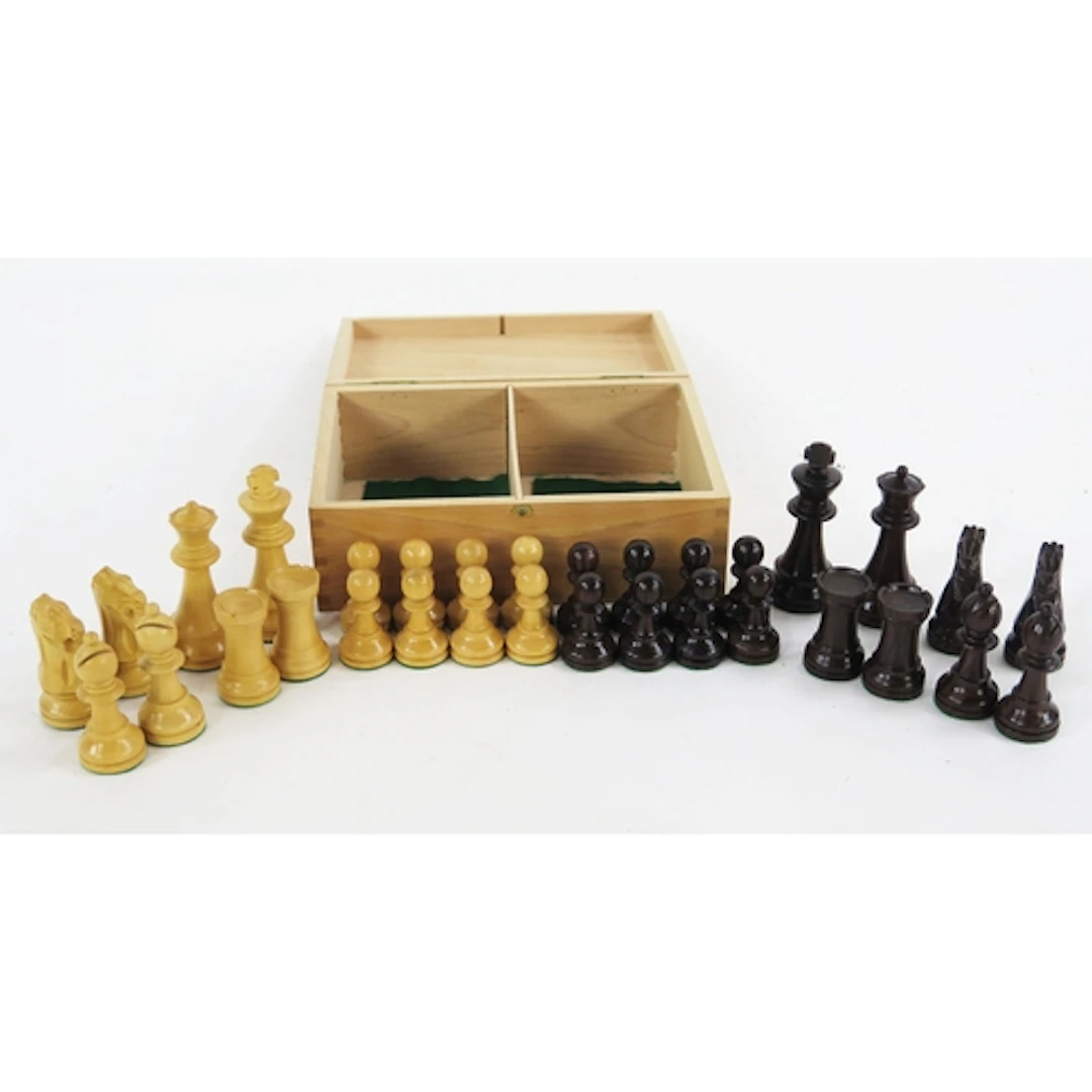 A Staunton pattern boxwood chess set, one side natural the o...
