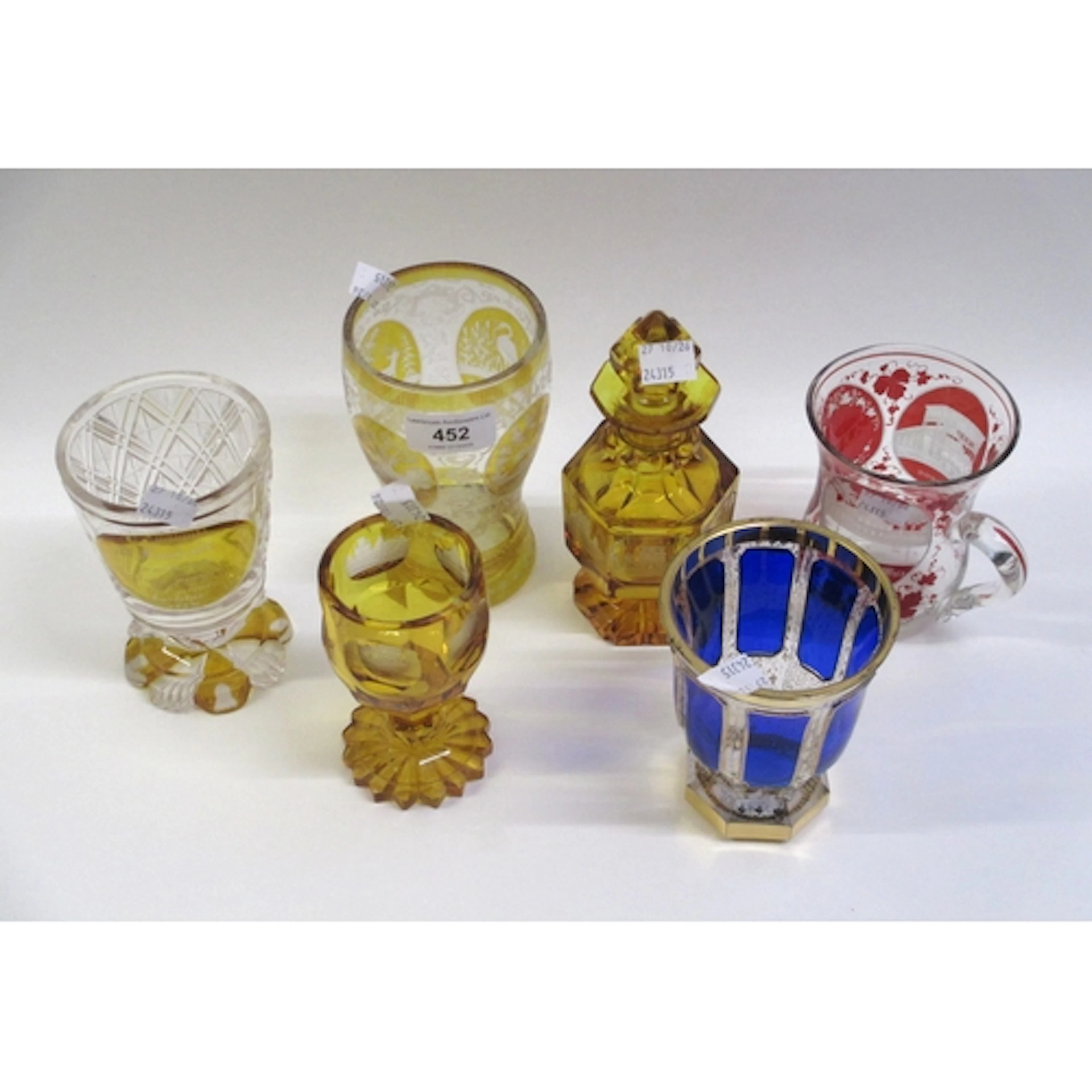 Collection of five etched, red, orange and blue gilt Bohemia...