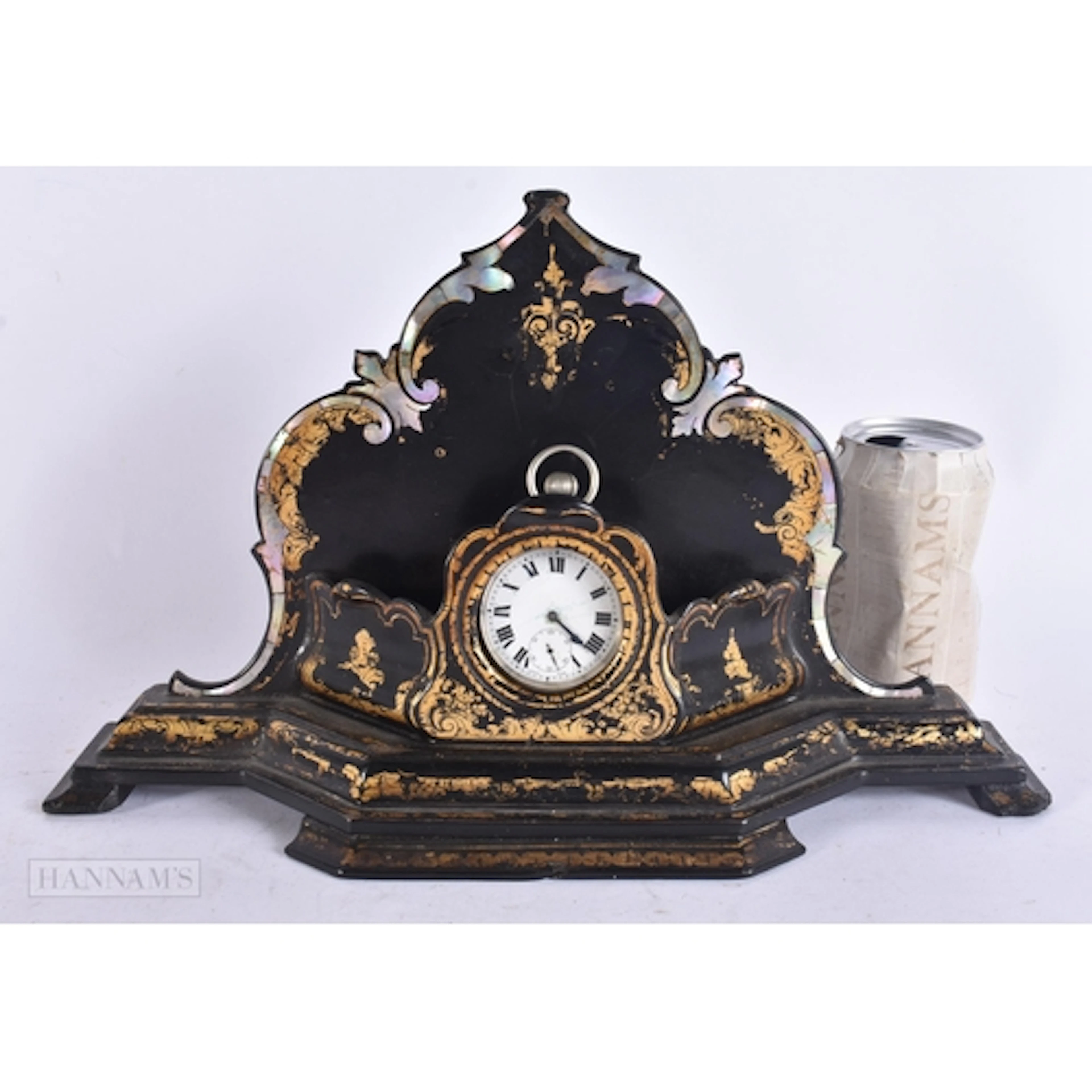 A VICTORIAN BLACK LACQUER PAPIER MACHE CLOCK DESK STAND. 34 ...