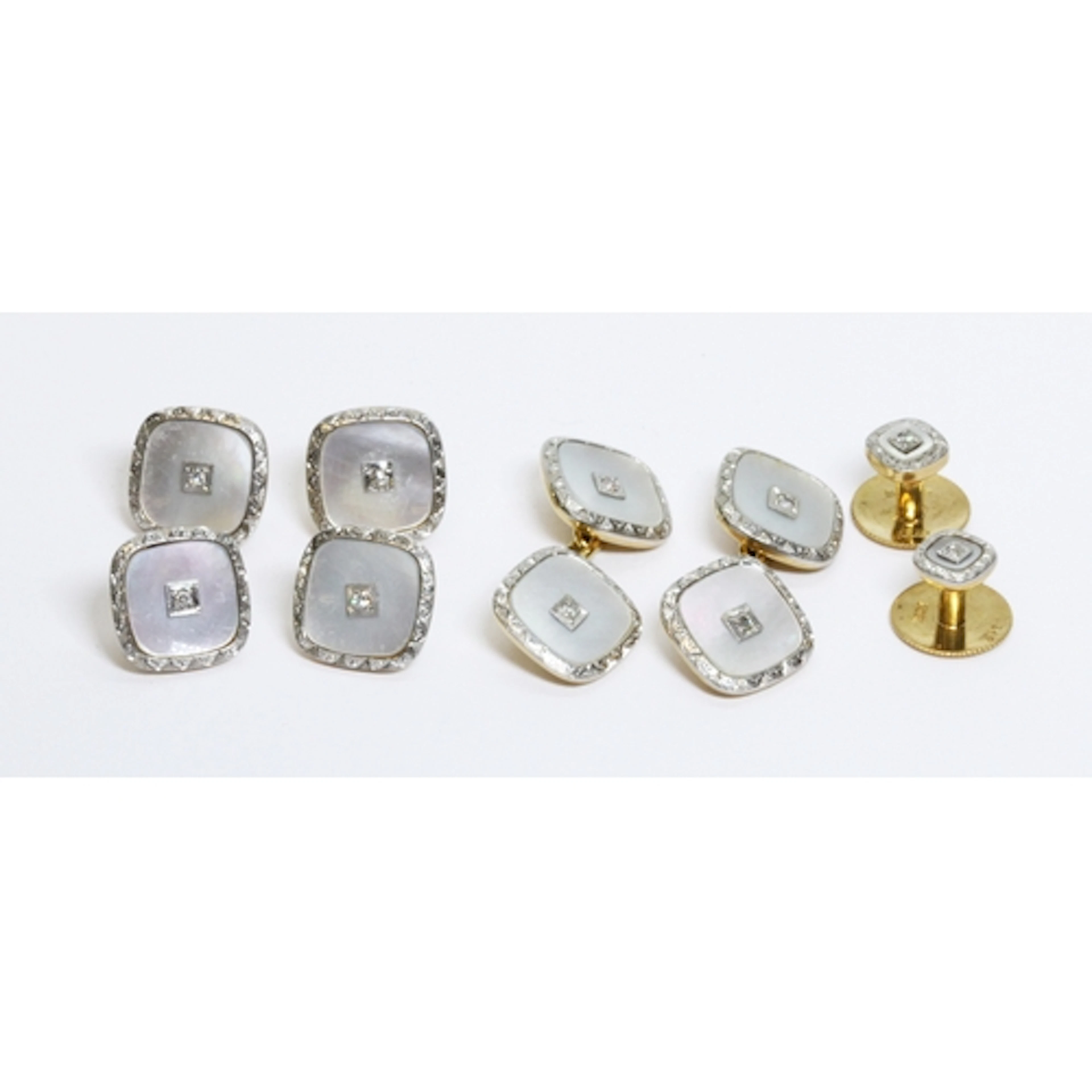 A set of Art Deco 18ct gold diamond and mother of pearl cuff...