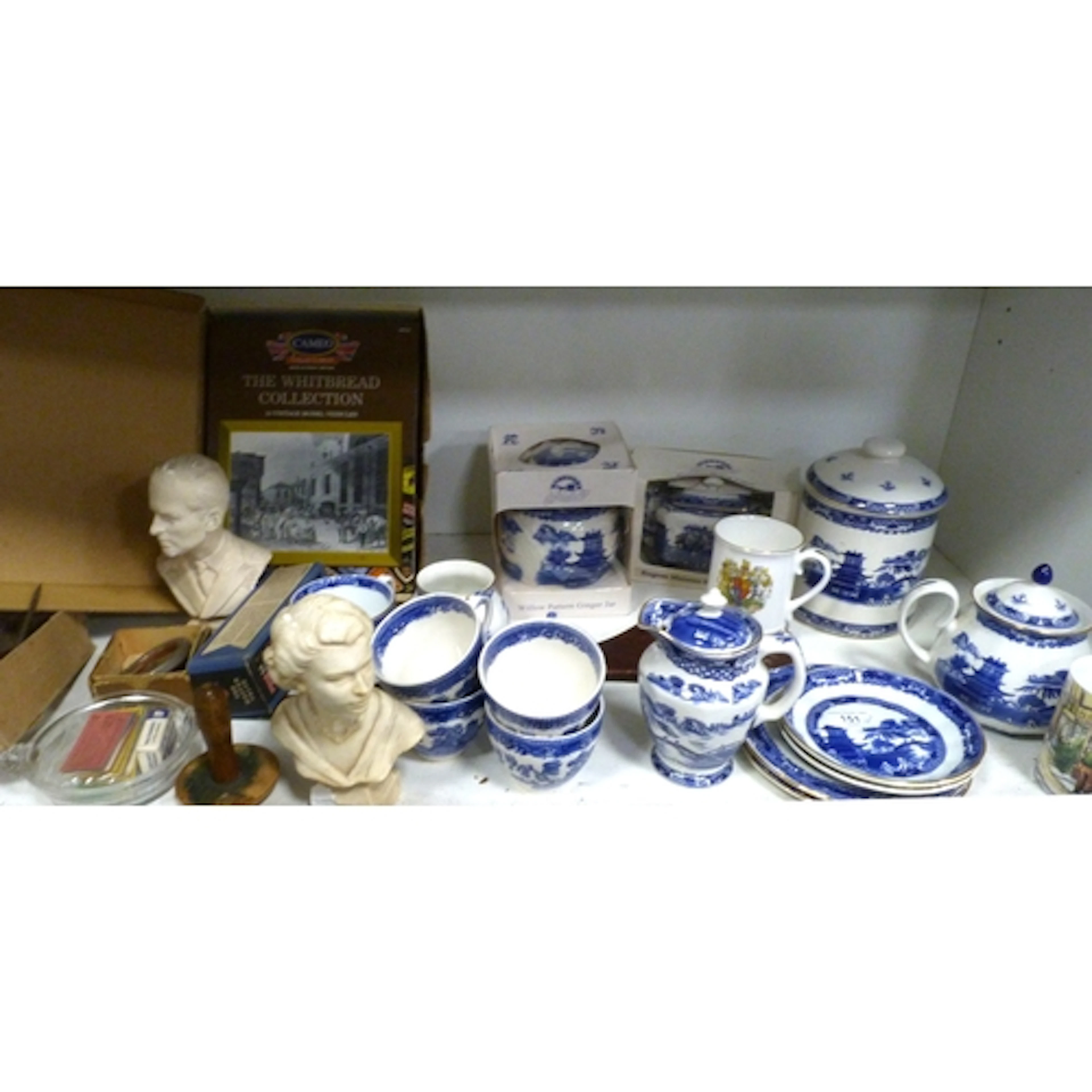 Shelf of ceramics to include Ringtons and similar blue and w...