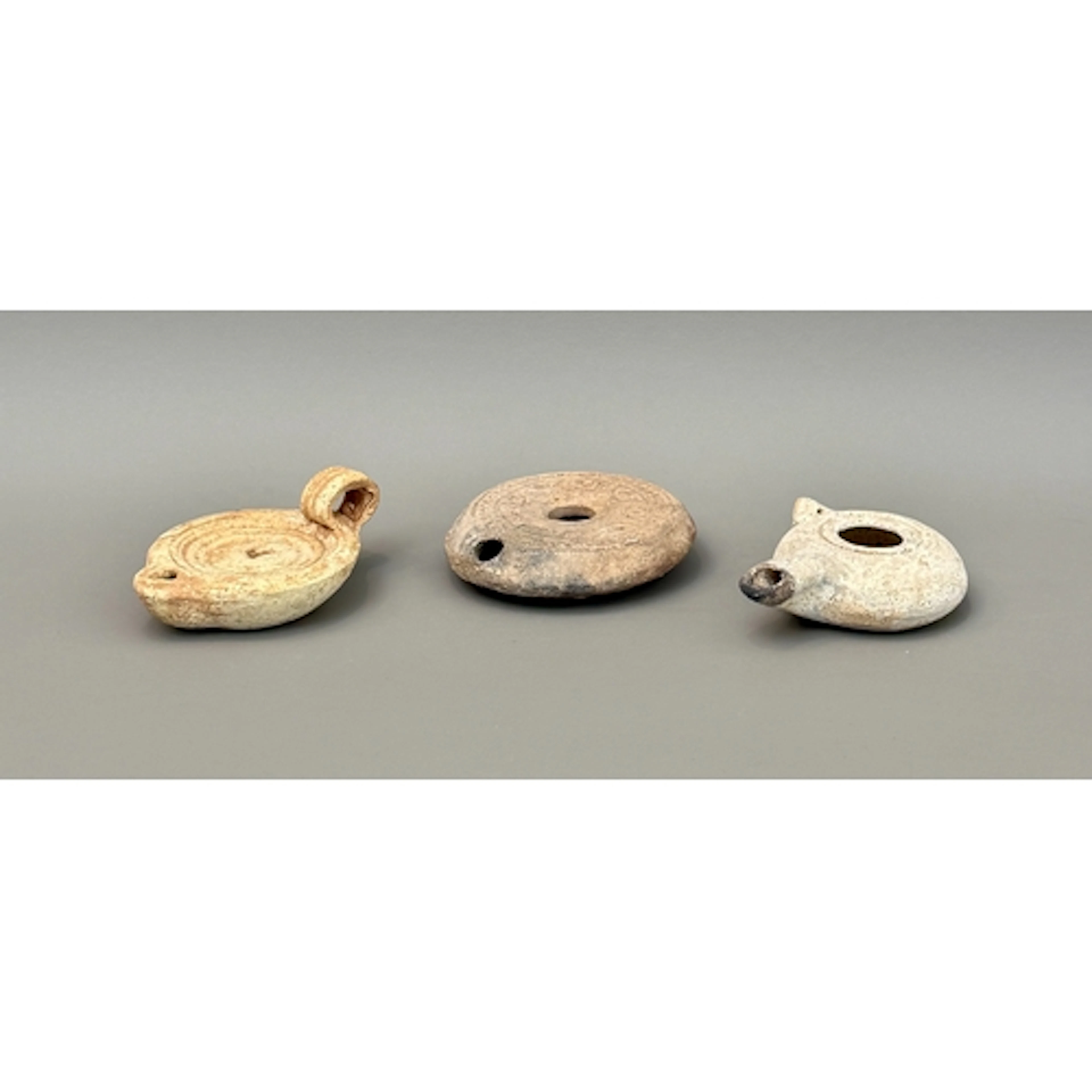 Antiquities: three Roman / Byzantine terracotta oil lamps - ...