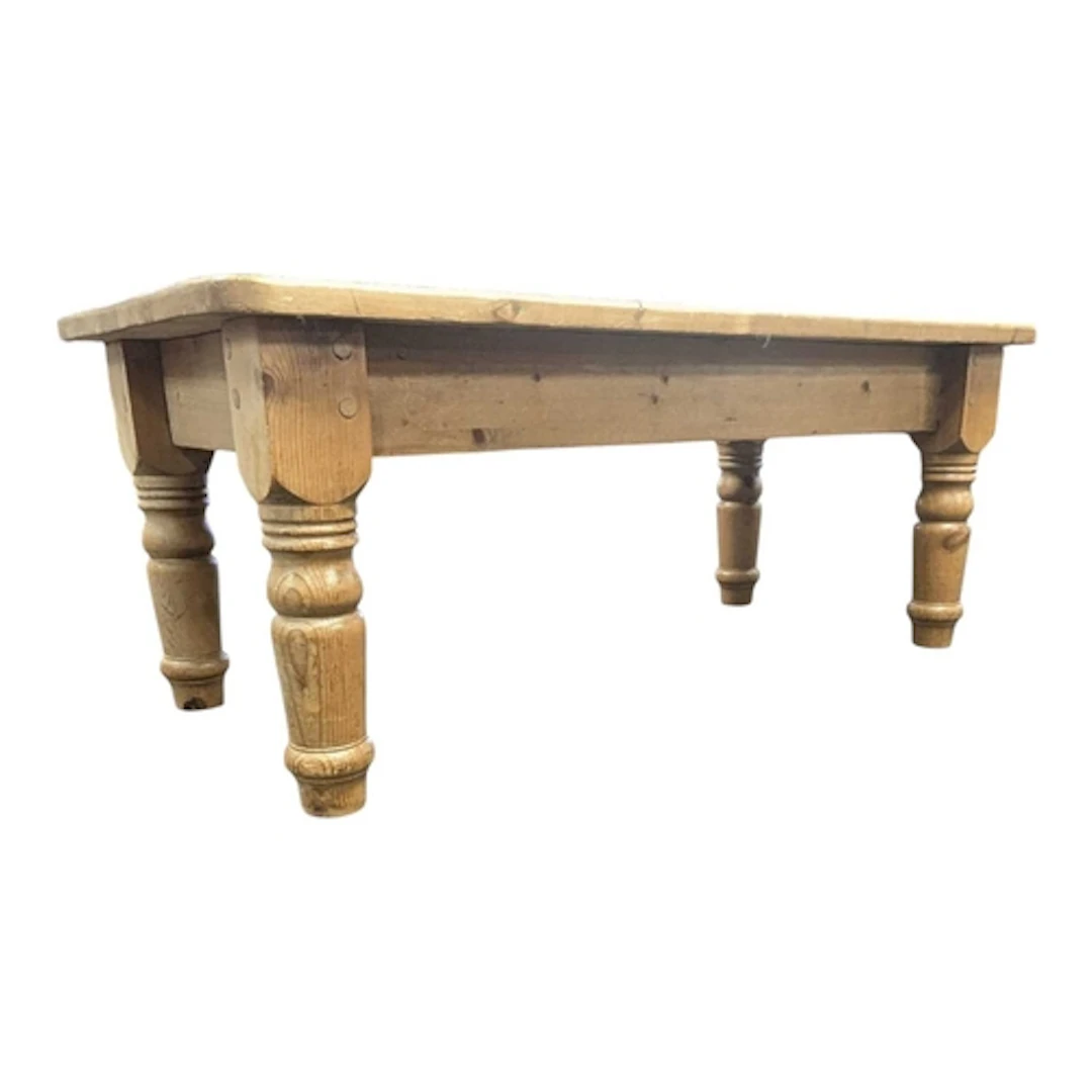 A large 20th century solid pine coffee table or low table. T...