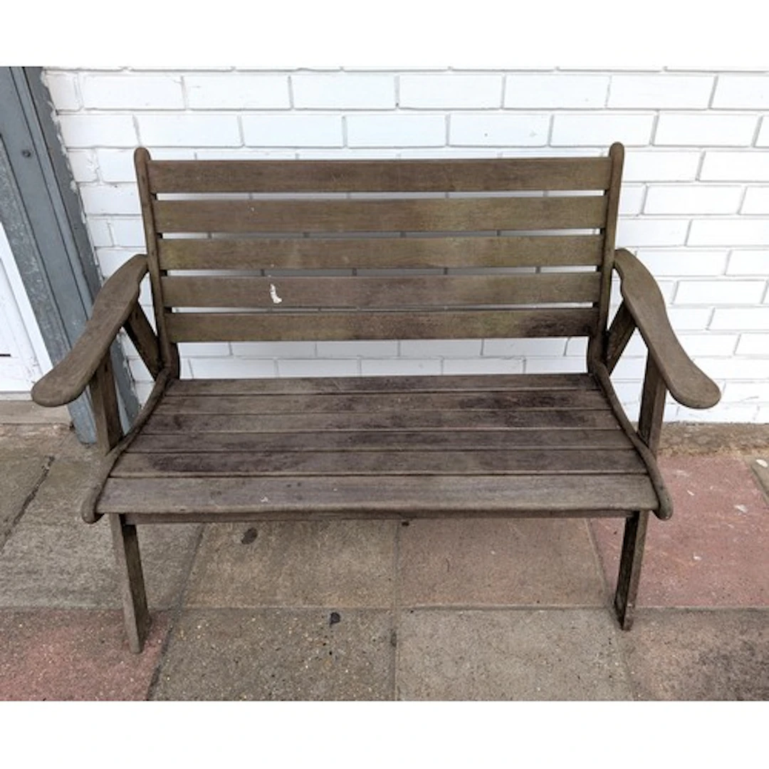 A small wooden garden bench