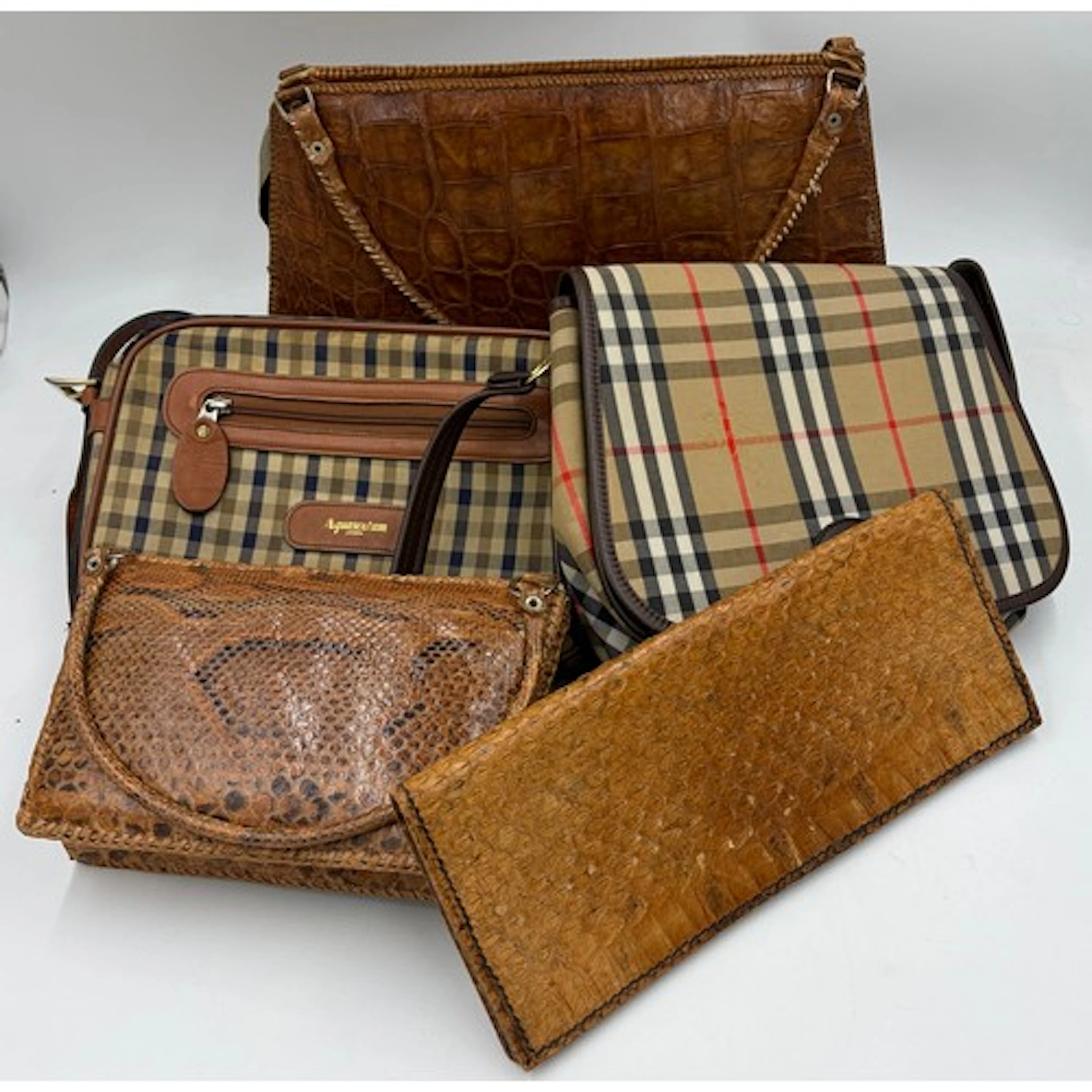 Collection of handbags to include Aquascutum, Burberry, Croc...