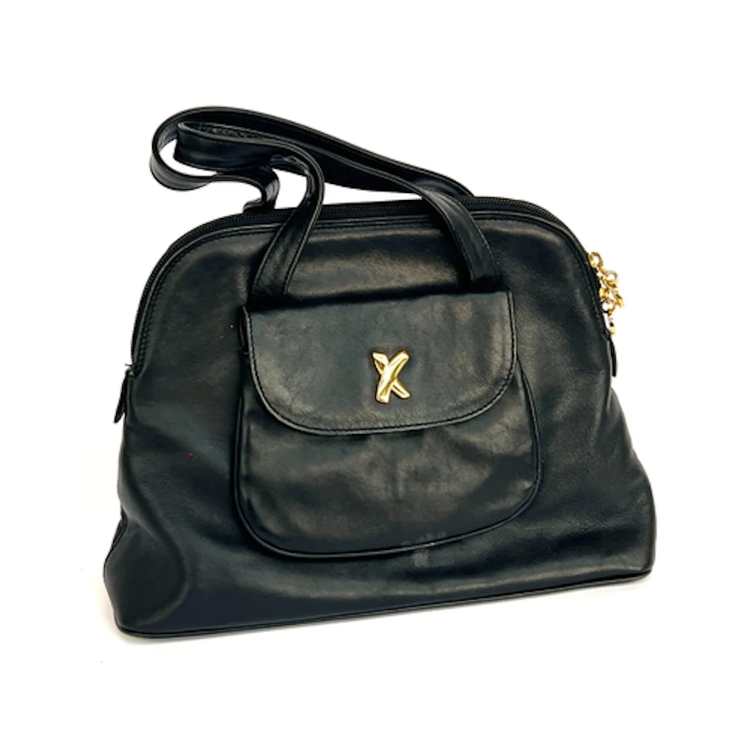 A Paloma Picasso black leather handbag, 32cmW, with dustbag