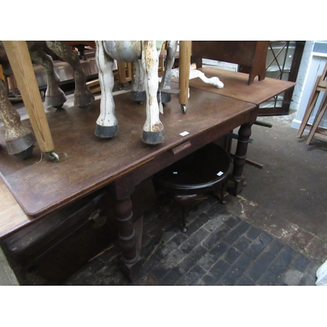 Early 20th Century oak rectangular draw-leaf dining table on...