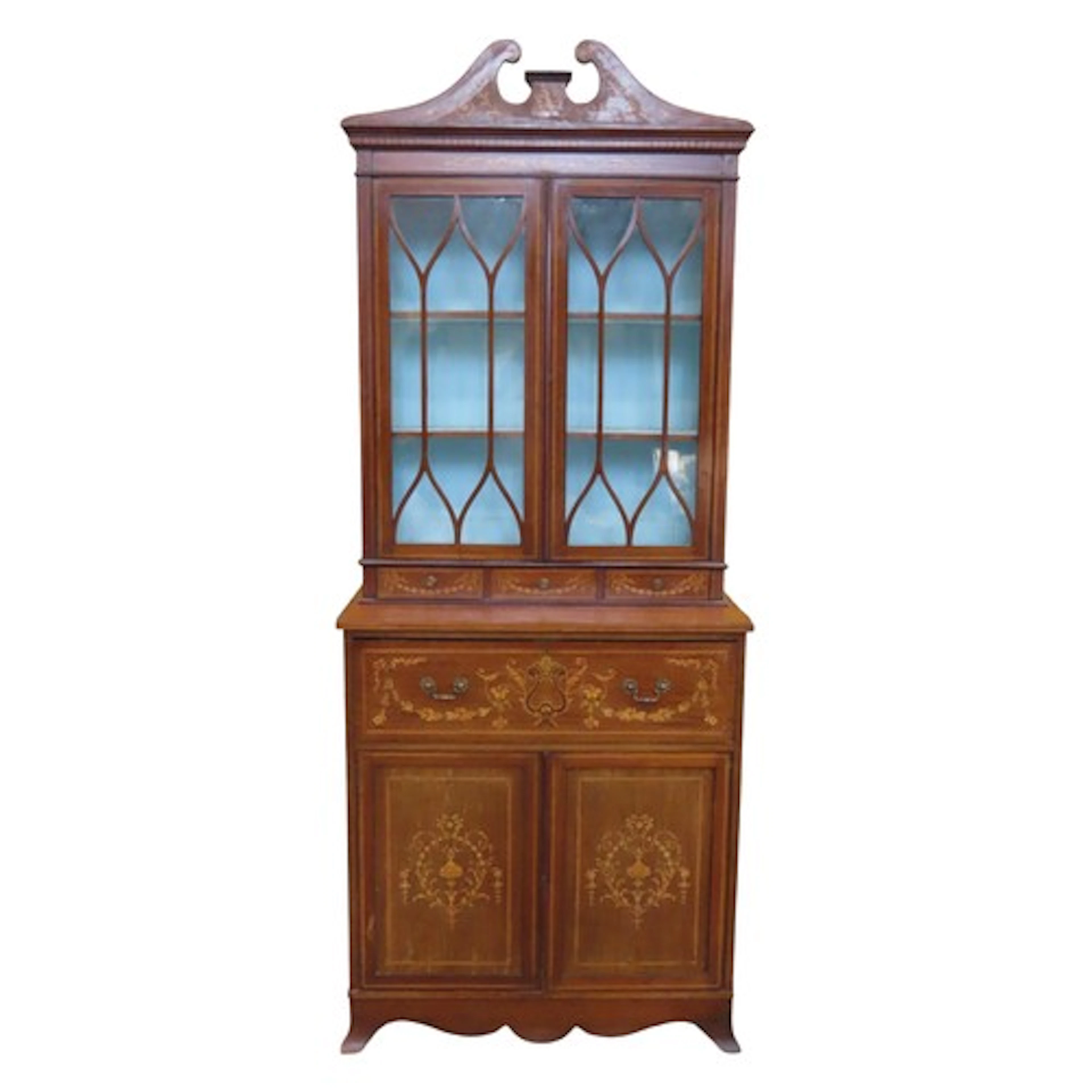 An Edwardian Sheraton revival secretaire bookcase with decor...