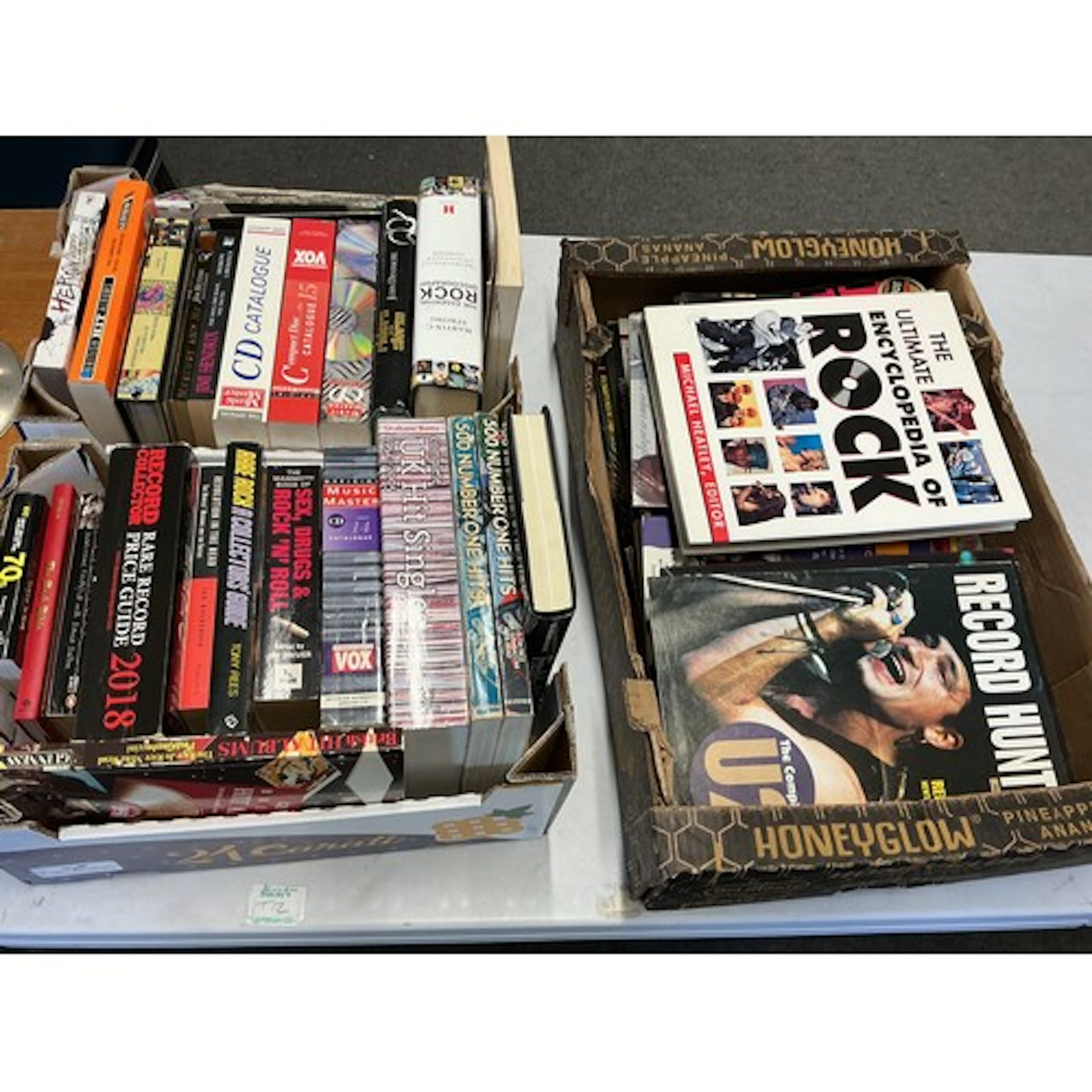 Three boxes of music books including Rare Record Guide, UK H...
