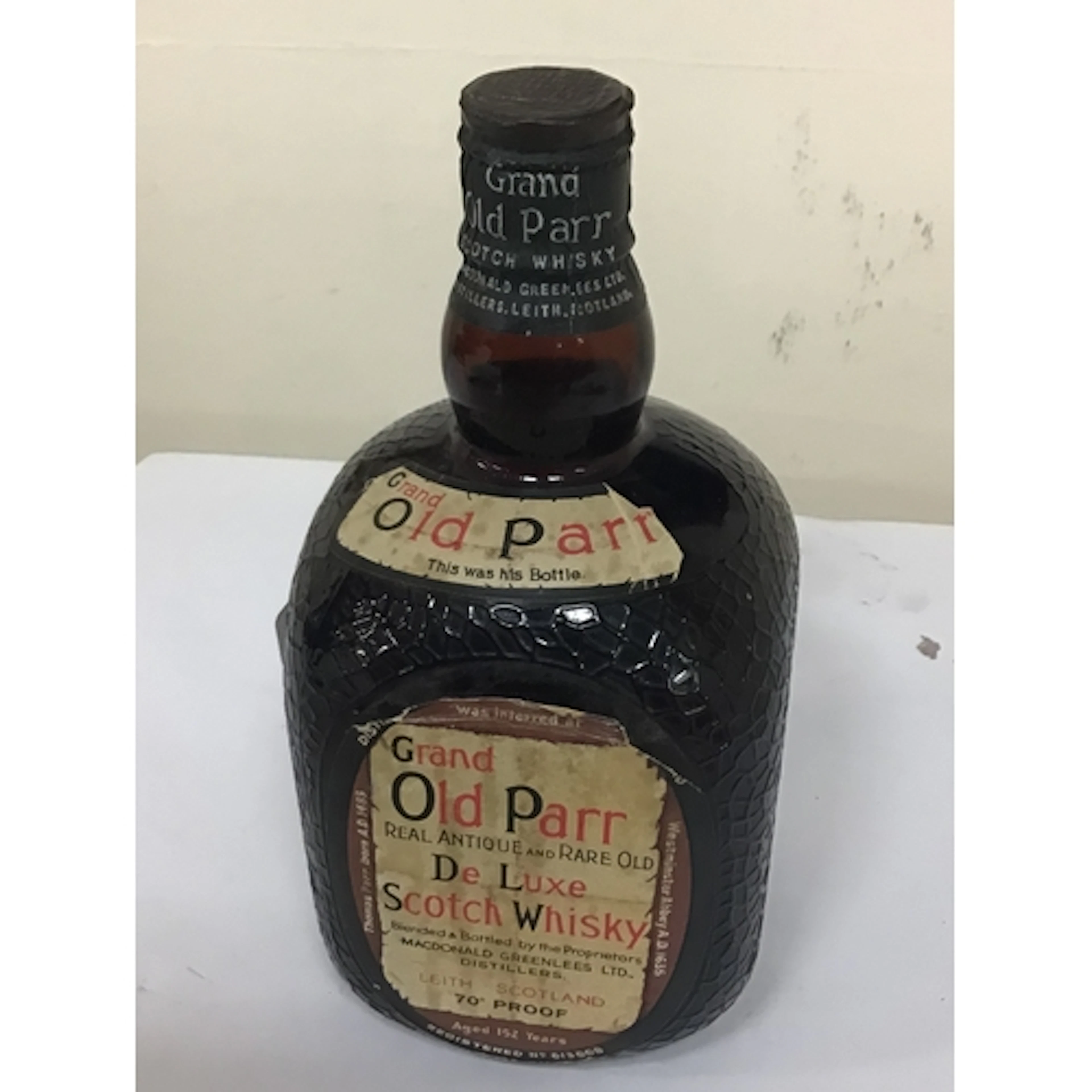 A Vintage bottle of Grand Old Parr De luxe Scotch Whis...