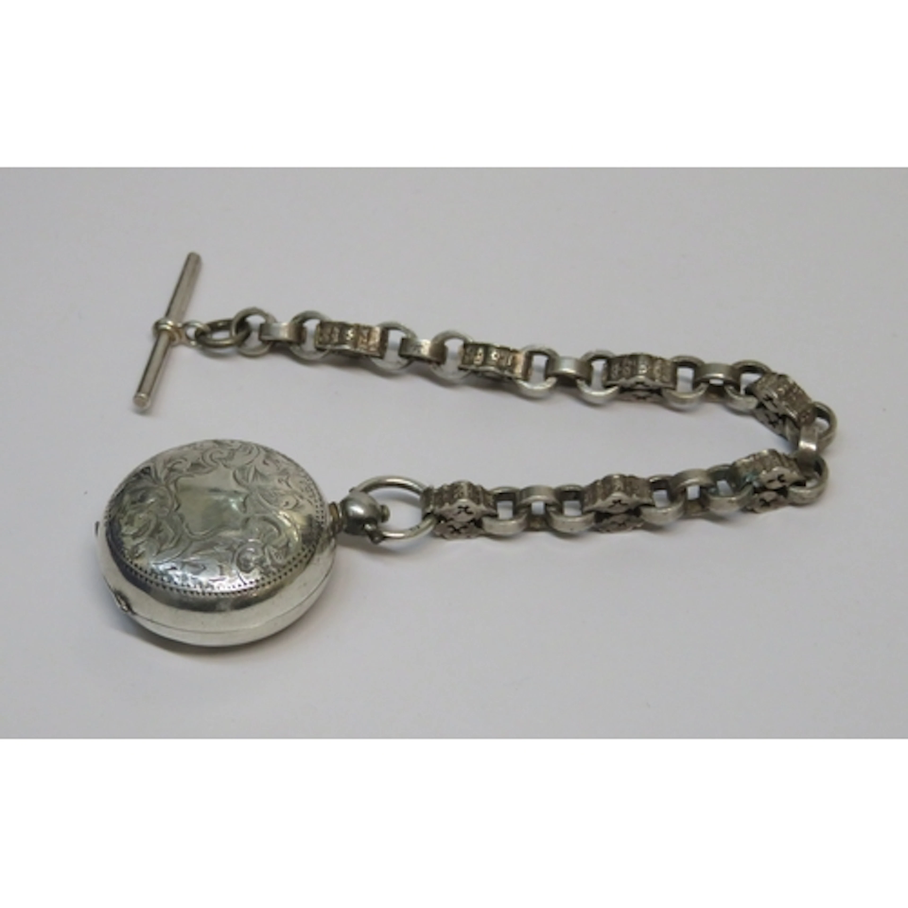 Engraved silver sovereign case, on guard chain, with bar, da...