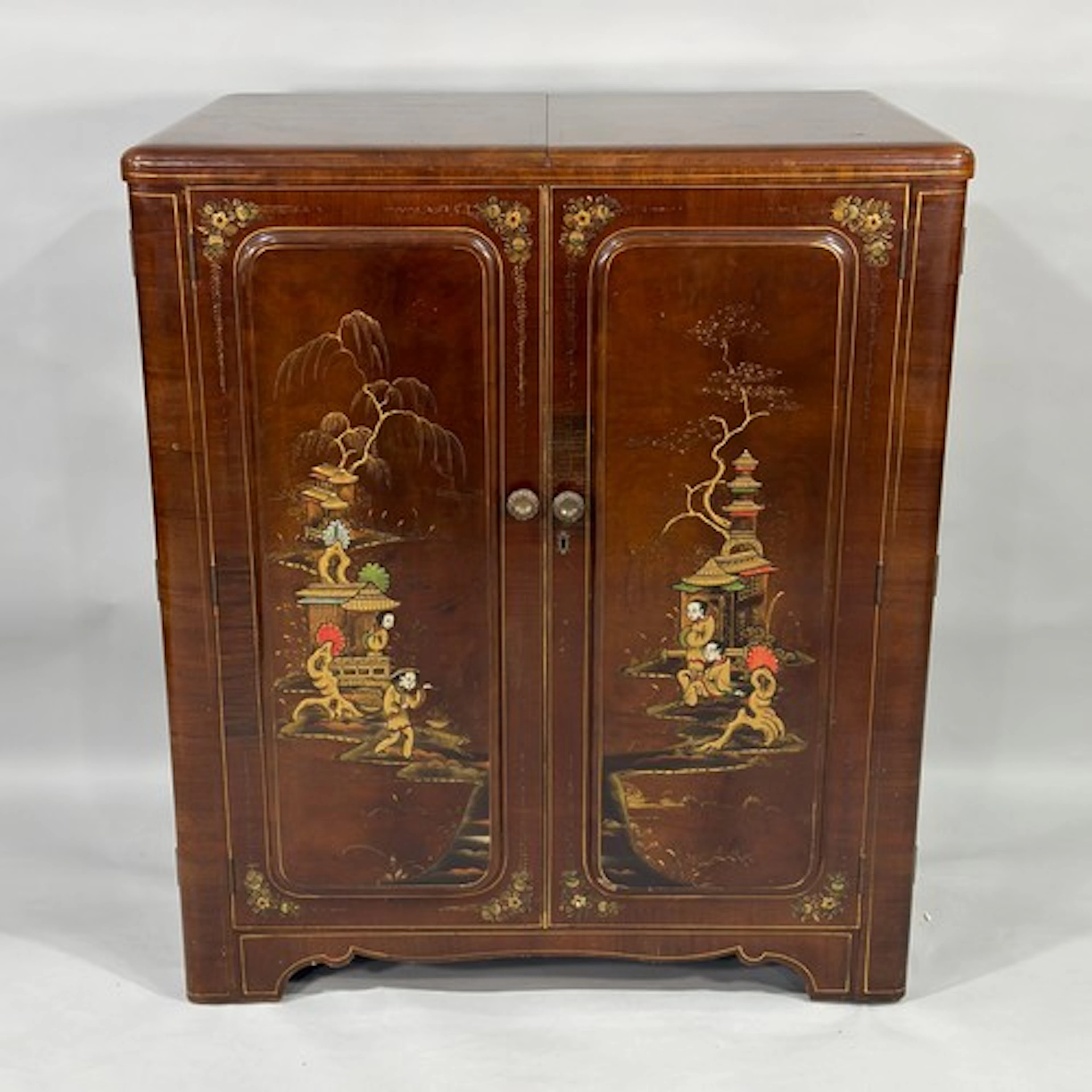 A mid 20th century walnut metamorphic Cocktail Cabinet/Loung...
