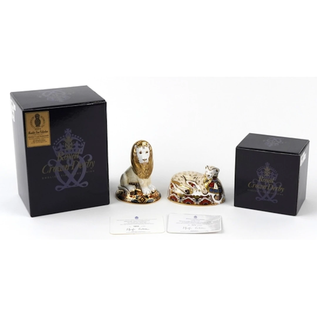 Two Royal Crown Derby paperweights comprising Heraldic Lion,...