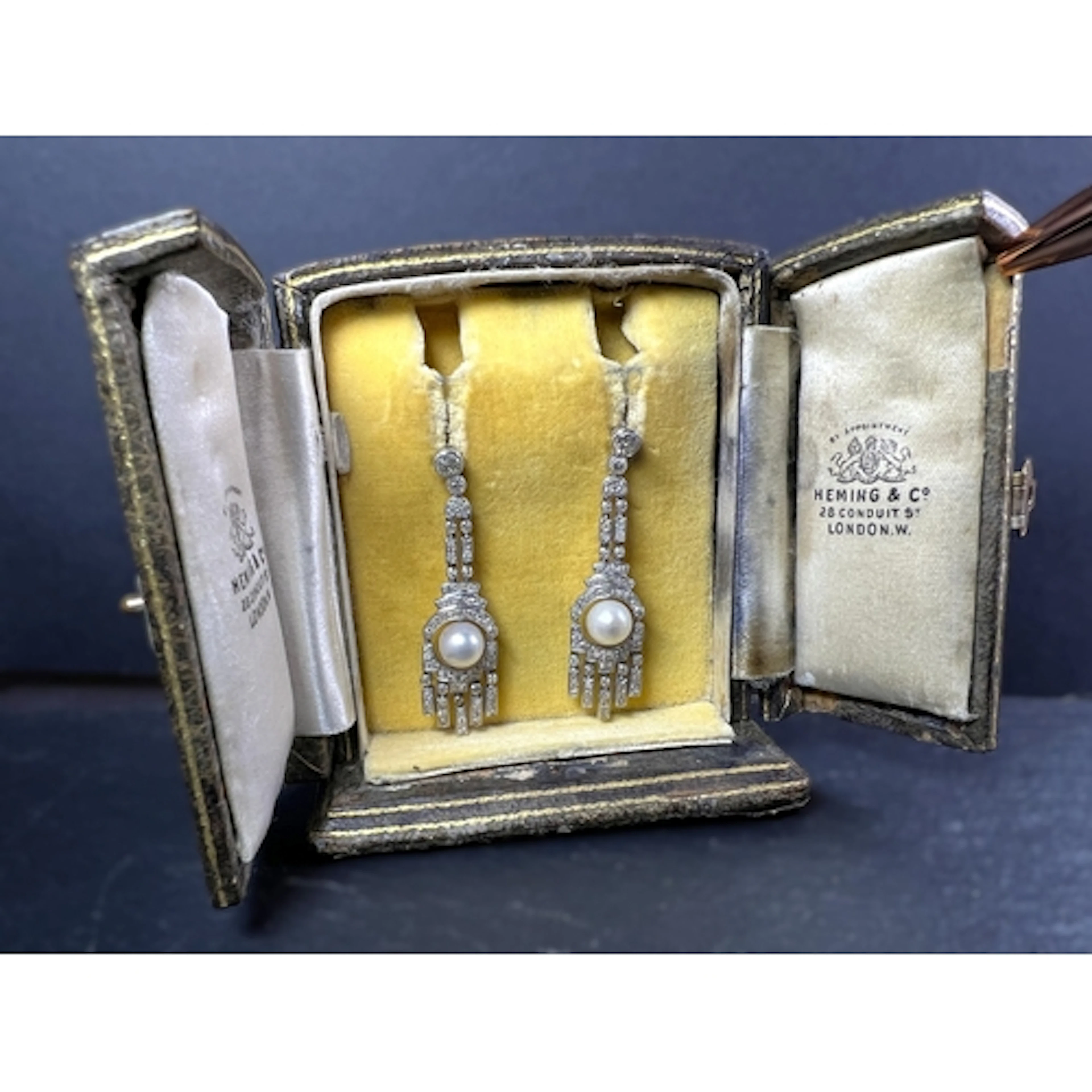 An elegant pair of Art Deco fringe drop pearl and diamond pe...