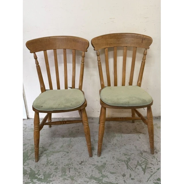 Two farmhouse pine kitchen chairs splat backs