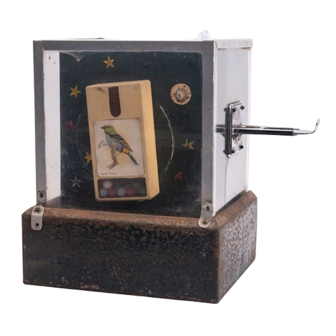 A mid 20th Century tabletop slot machine. having a perspex c...